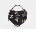 NWT Coach Heart Crossbody Bag
With Bow Print
