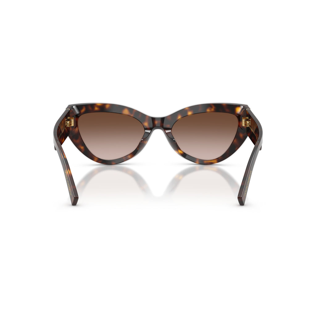 Cat-Eye Sunglasses With Tortoiseshell Frame And Gold Embellishments
