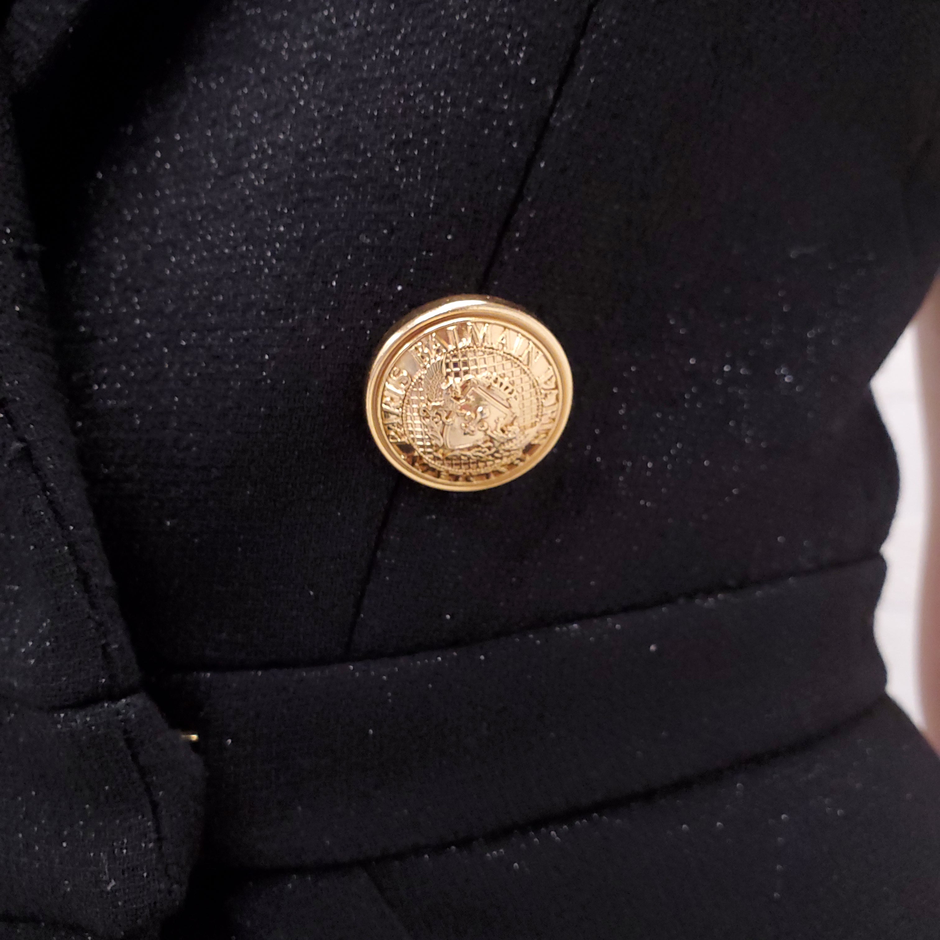 BALMAIN BLACK JUMPSUIT WITH LAPELS AND GOLD LOGO BUTTONS - SIZE XS