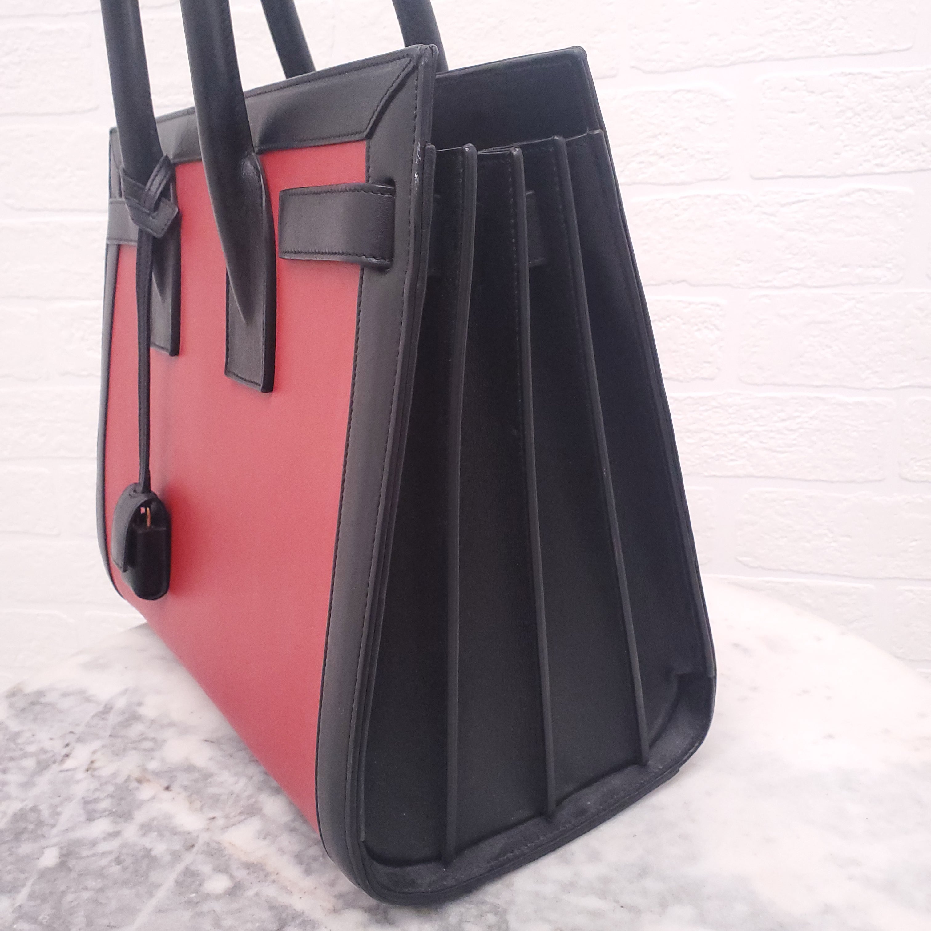 SAINT LAURENT RED AND BLACK SAC DE JOUR