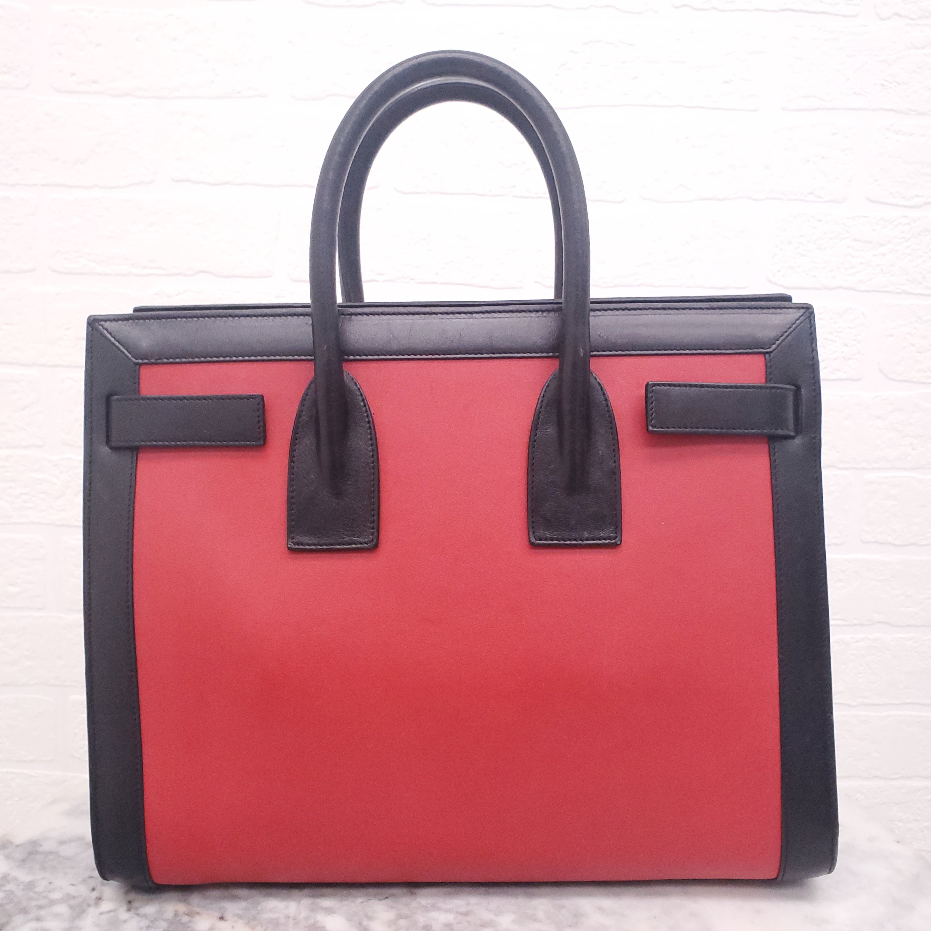 SAINT LAURENT RED AND BLACK SAC DE JOUR
