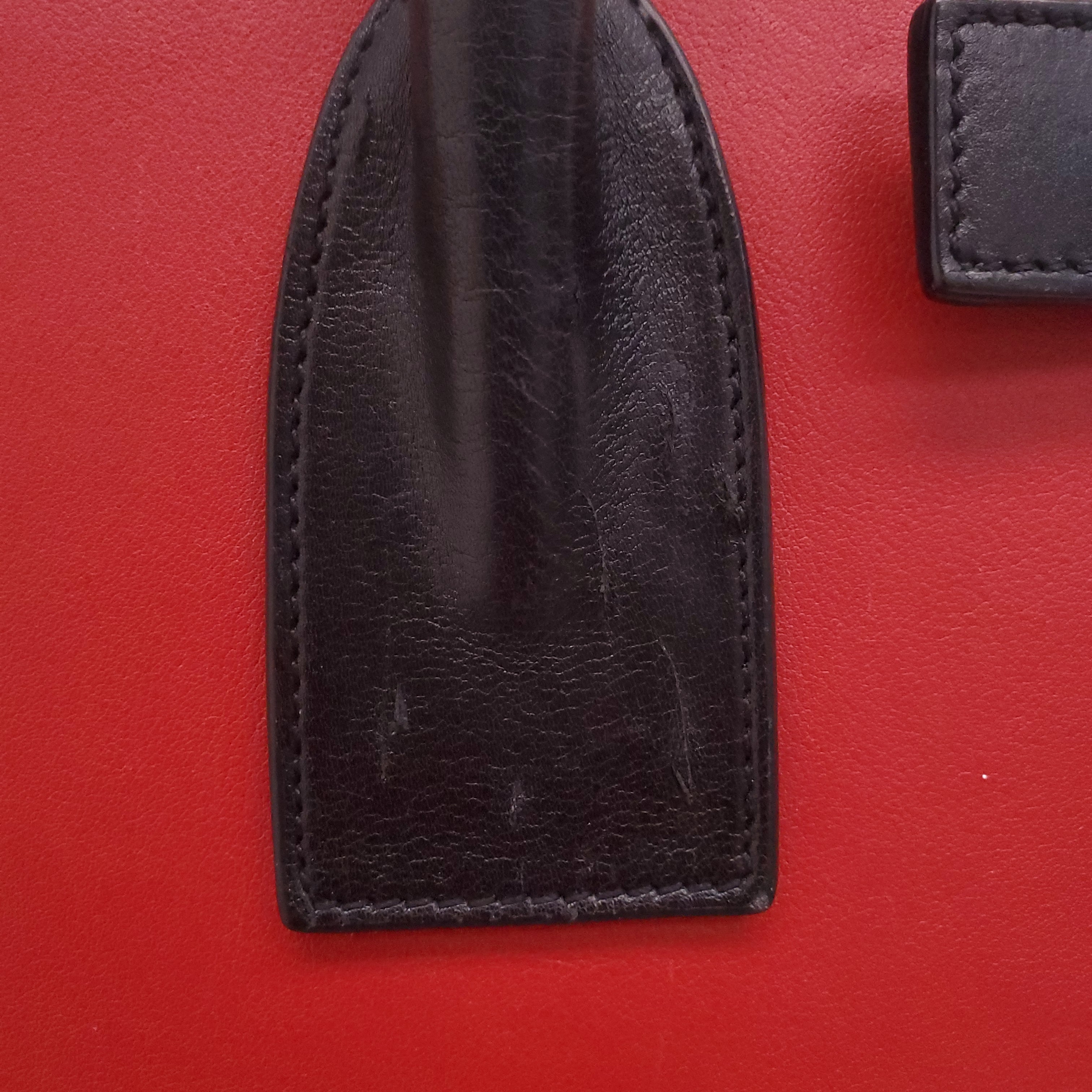SAINT LAURENT RED AND BLACK SAC DE JOUR