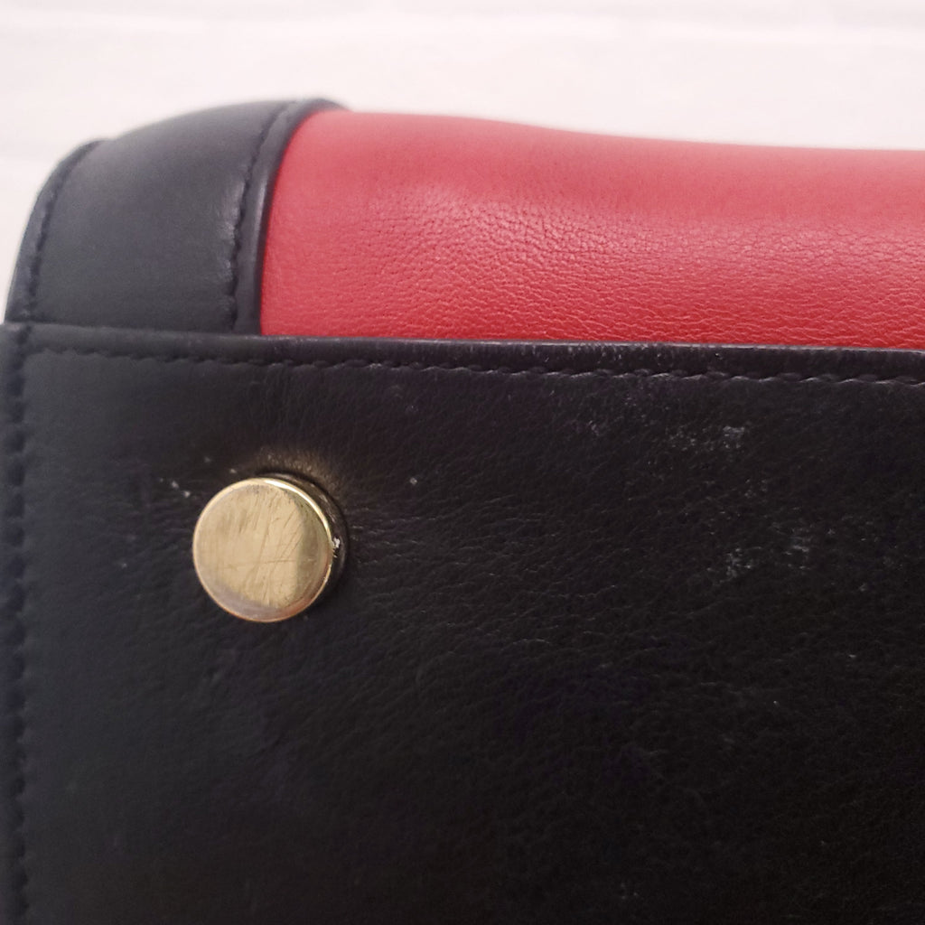SAINT LAURENT RED AND BLACK SAC DE JOUR