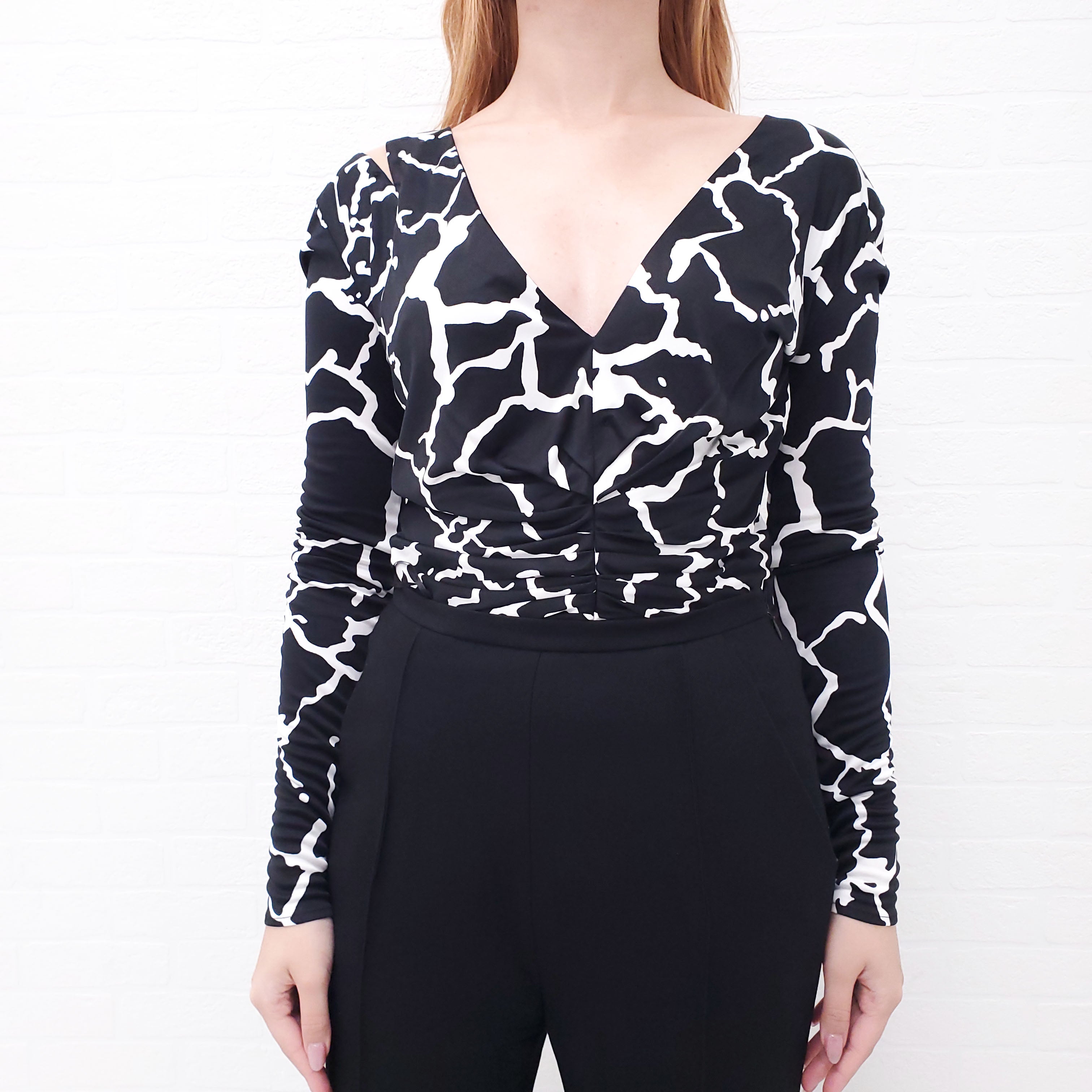 VERSACE BLACK AND WHITE PATTERN BODYSUIT - SIZE 4