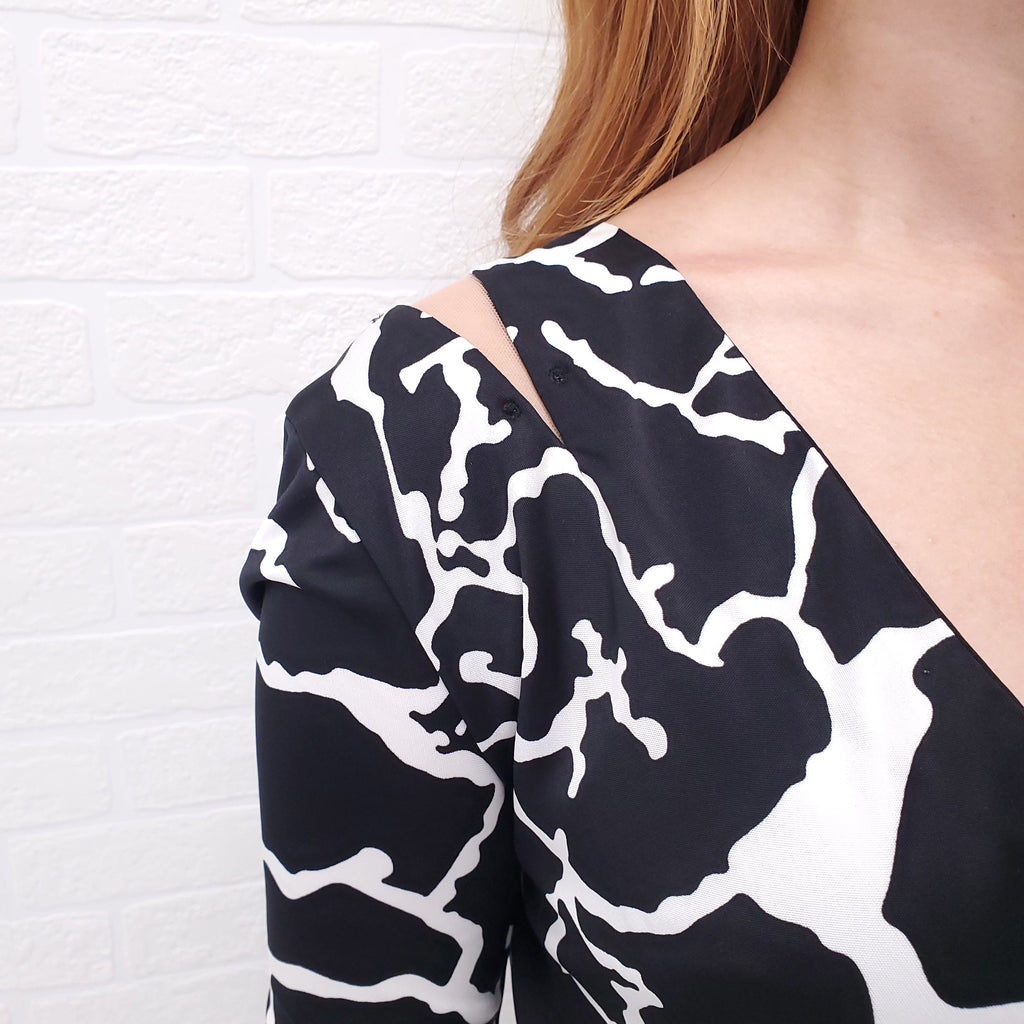 VERSACE BLACK AND WHITE PATTERN BODYSUIT - SIZE 4