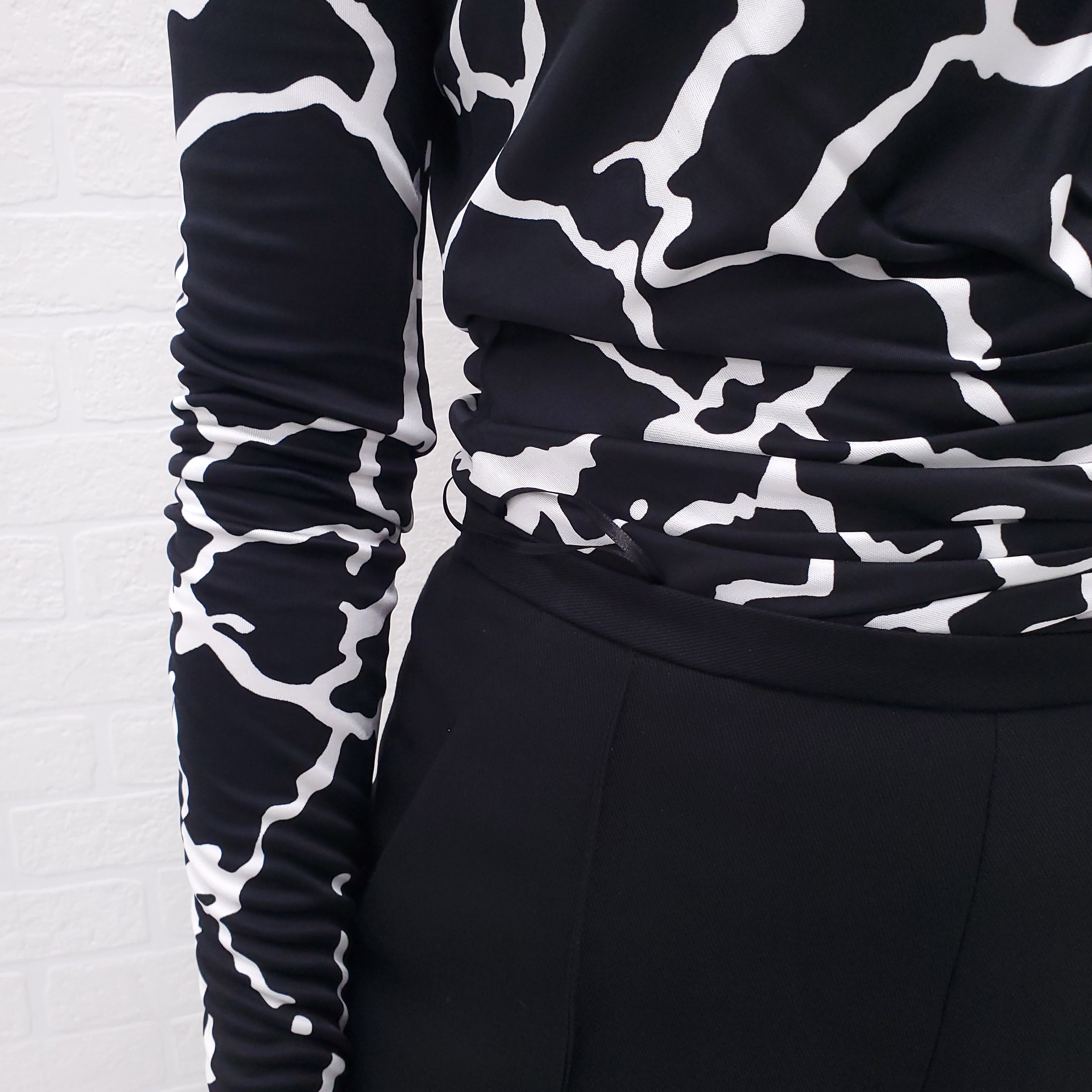VERSACE BLACK AND WHITE PATTERN BODYSUIT - SIZE 4