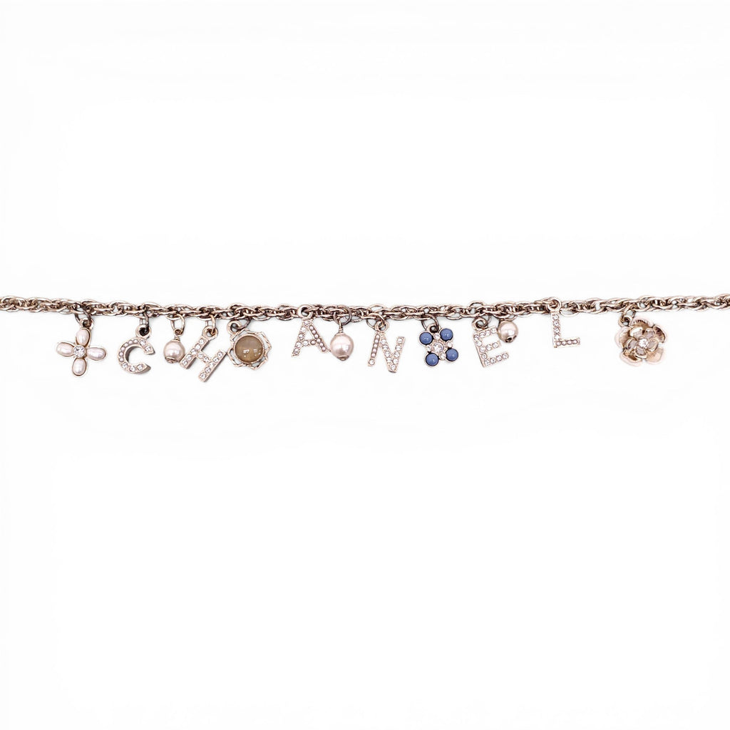 CHANEL GOLD LETTER CRYSTAL FLOWER CHAIN NECKLACE