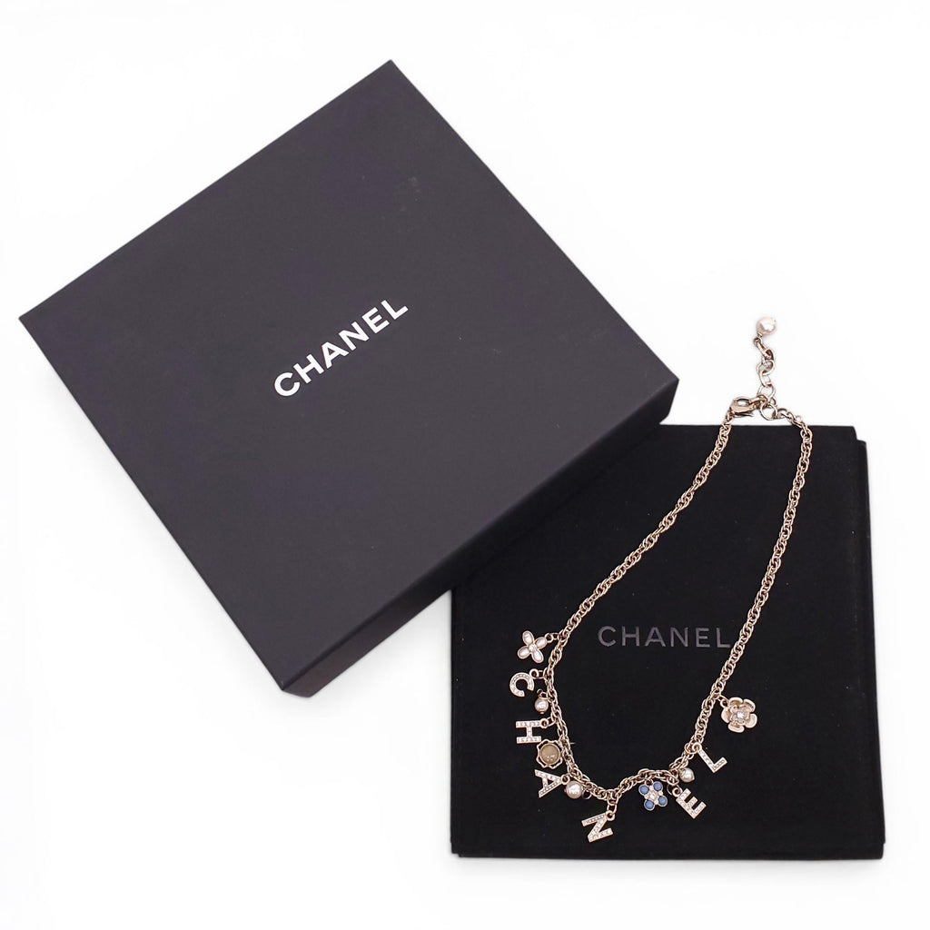 CHANEL GOLD LETTER CRYSTAL FLOWER CHAIN NECKLACE