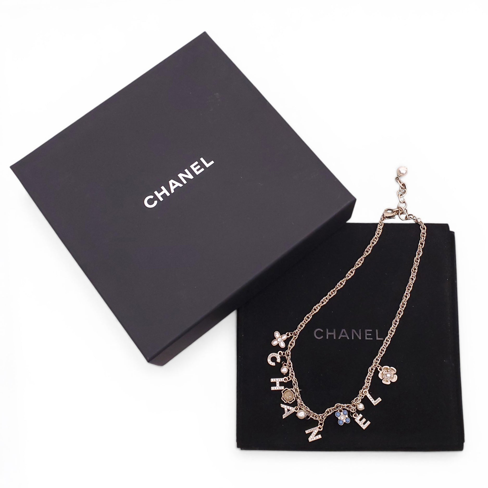CHANEL GOLD LETTER CRYSTAL FLOWER CHAIN NECKLACE