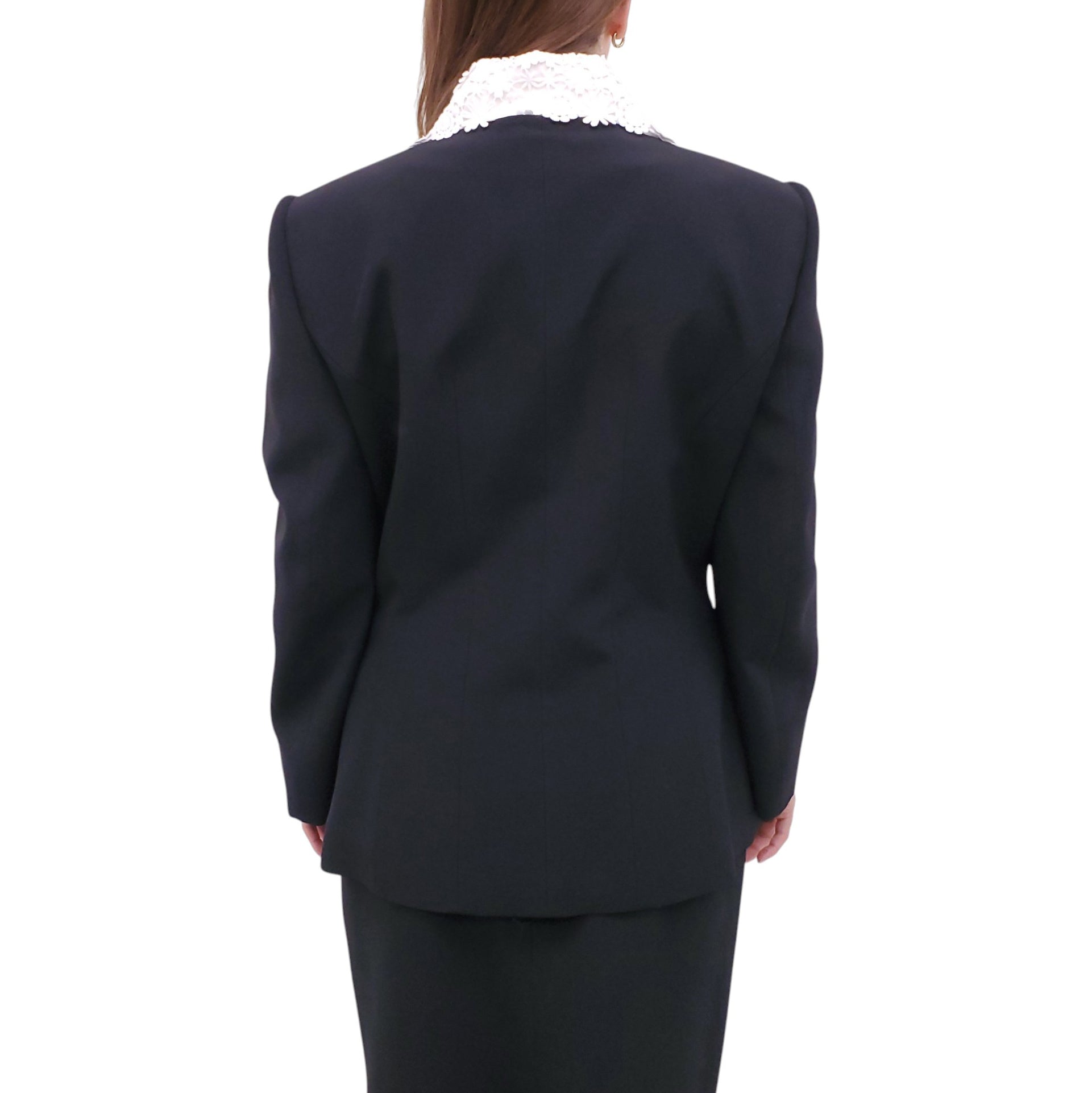 ANDREW GN BLACK SKIRT SUIT WITH FLORAL EYELET COLLAR AND CRYSTAL EMBLEM DETAILS - SIZE 46