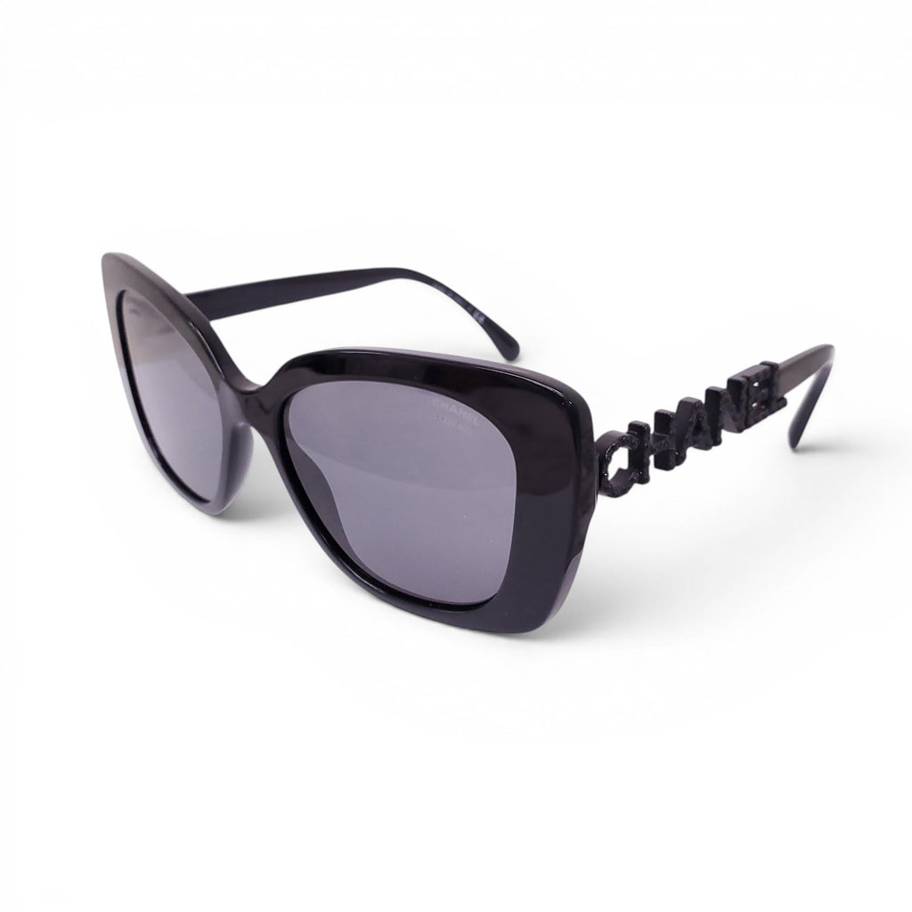 CHANEL BLACK SUNGLASSES WITH CRYSTAL LOGO DETAIL
