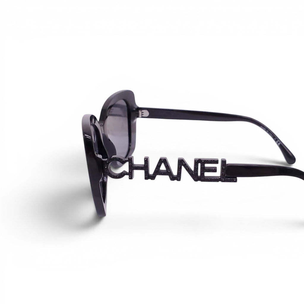 CHANEL BLACK SUNGLASSES WITH CRYSTAL LOGO DETAIL