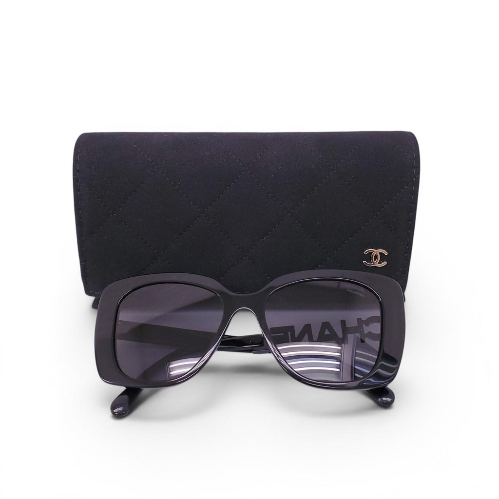 CHANEL BLACK SUNGLASSES WITH CRYSTAL LOGO DETAIL