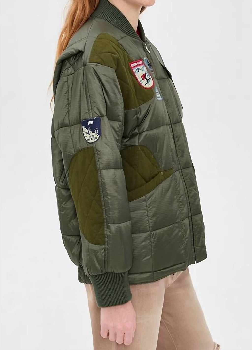 Eira Quilted Patched Puffer Jacket In Sea