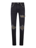 Amiri Men Skinny Jeans With Studs And Destroy Details