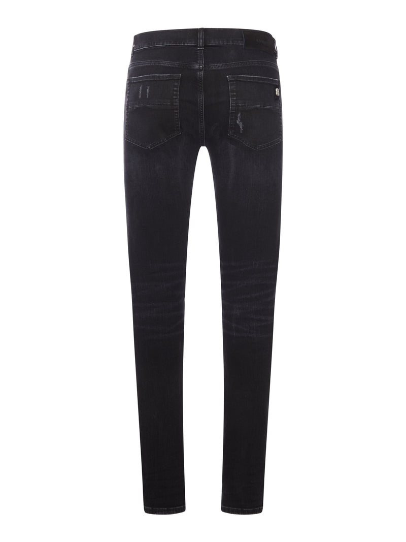 Amiri Men Skinny Jeans With Studs And Destroy Details