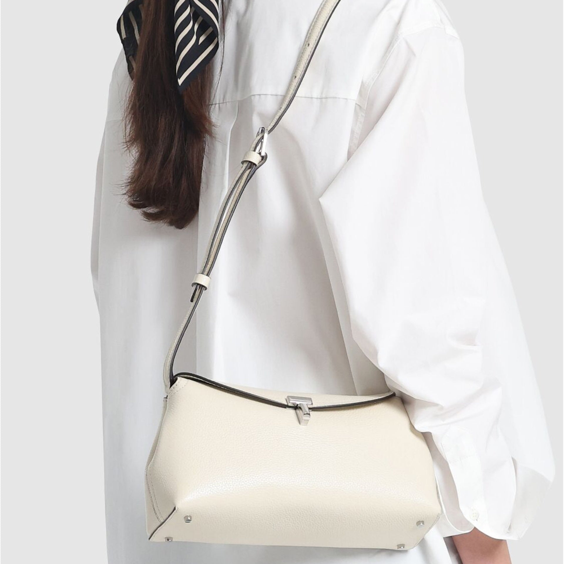 Toteme T-Lock Leather Clutch Bag Women