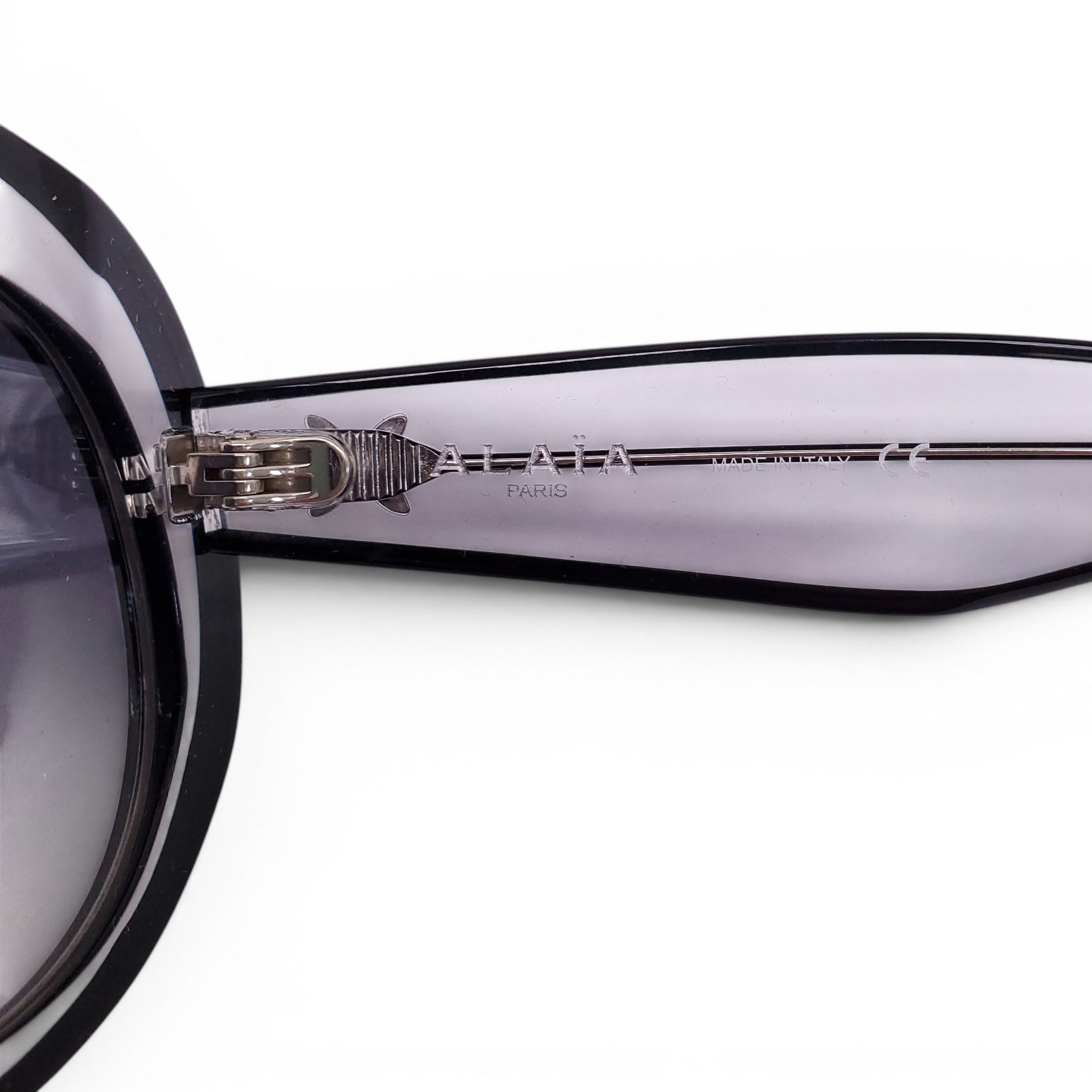 ALAÏA BLACK AND CLEAR CONTRAST LUCITE SUNGLASSES