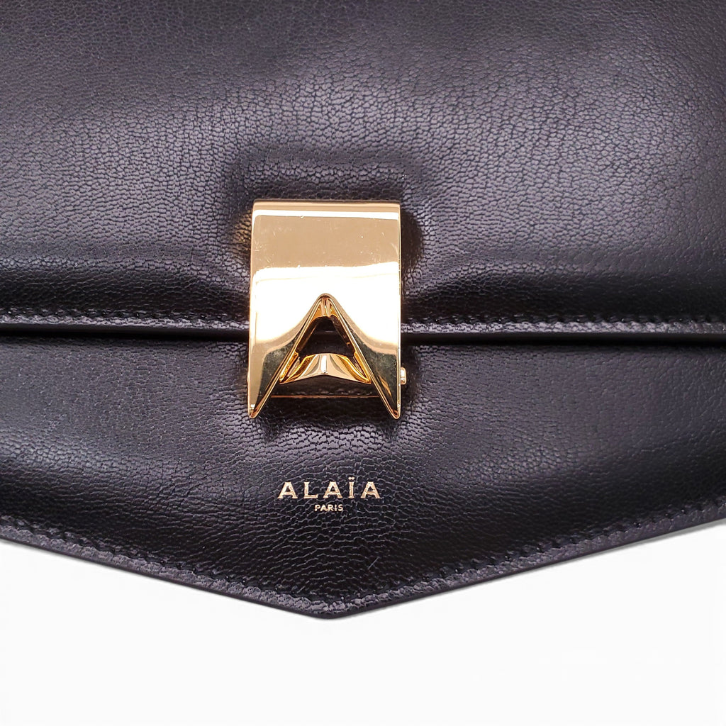 ALAÏA 'LE PAPA' LEATHER CROSSBODY BAG