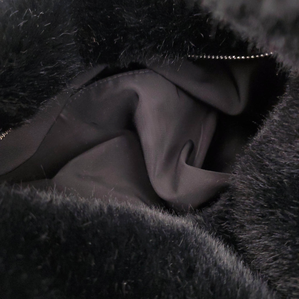 ALEXANDERWANG BLACK FAUX FUR MINI BAG WITH CRYSTAL LOGO DETAIL