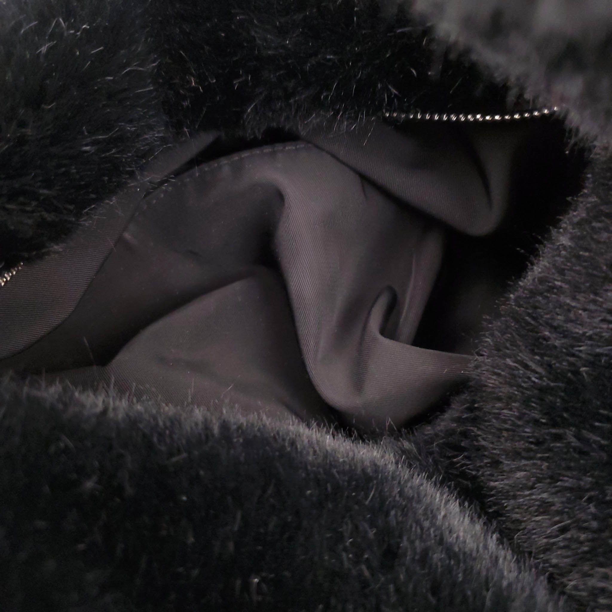 ALEXANDERWANG BLACK FAUX FUR MINI BAG WITH CRYSTAL LOGO DETAIL