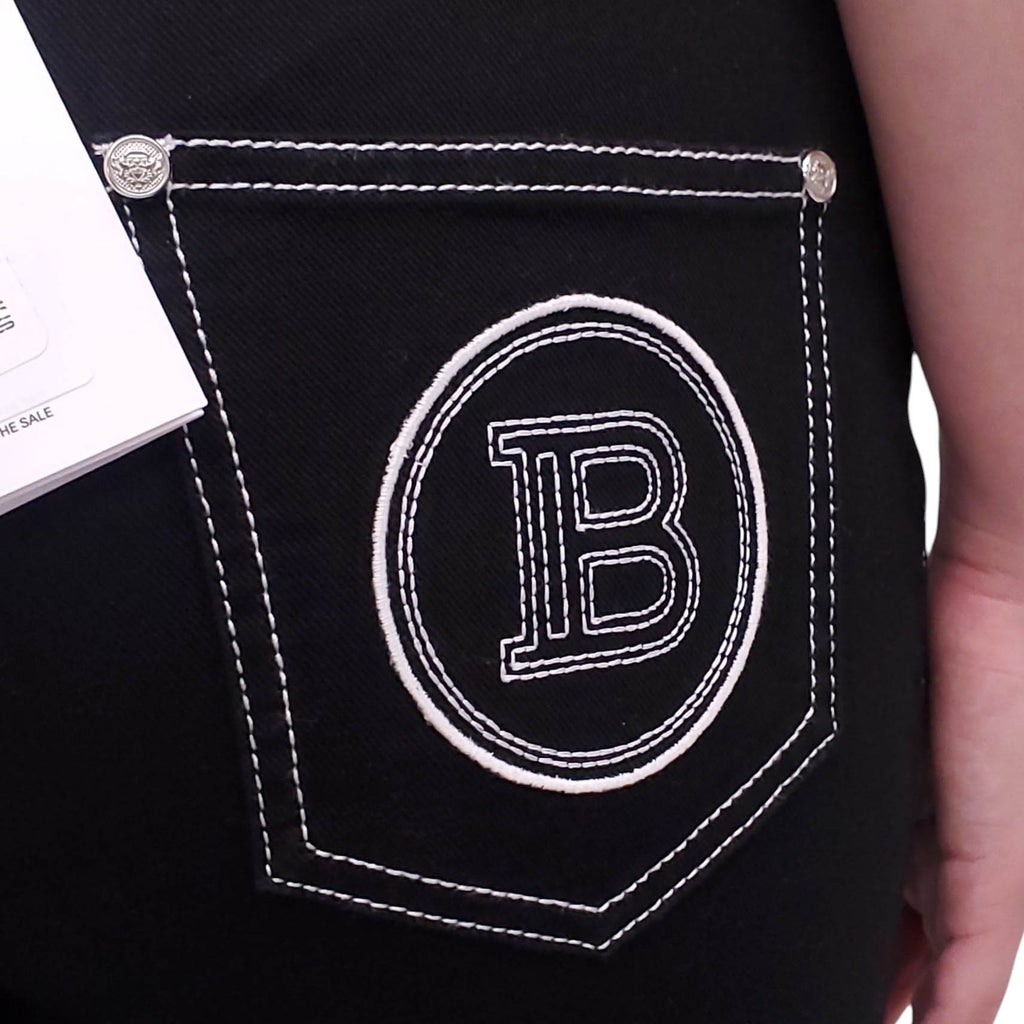 BALMAIN BLACK DENIM PANTS WITH WHITE STITCHING - SIZE 42