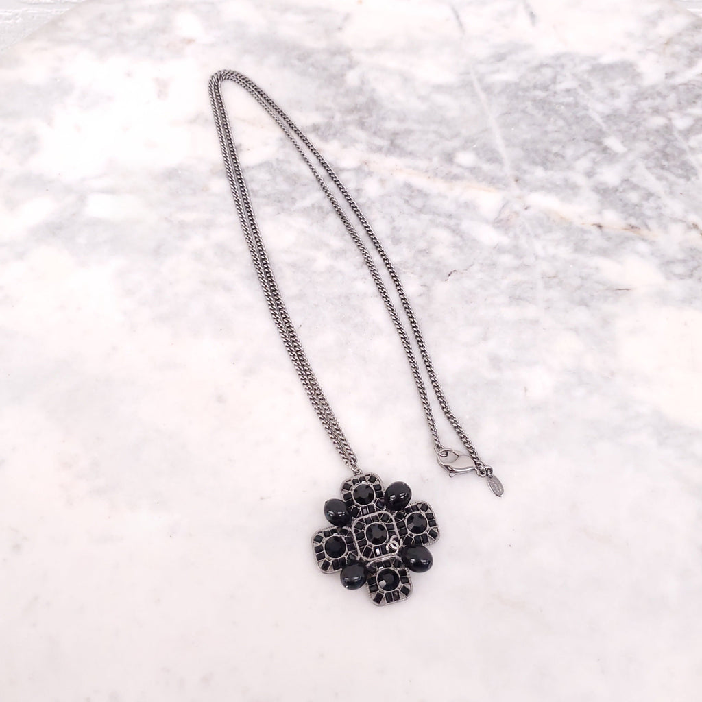 CHANEL BLACK CRYSTAL CROSS WITH LOGO