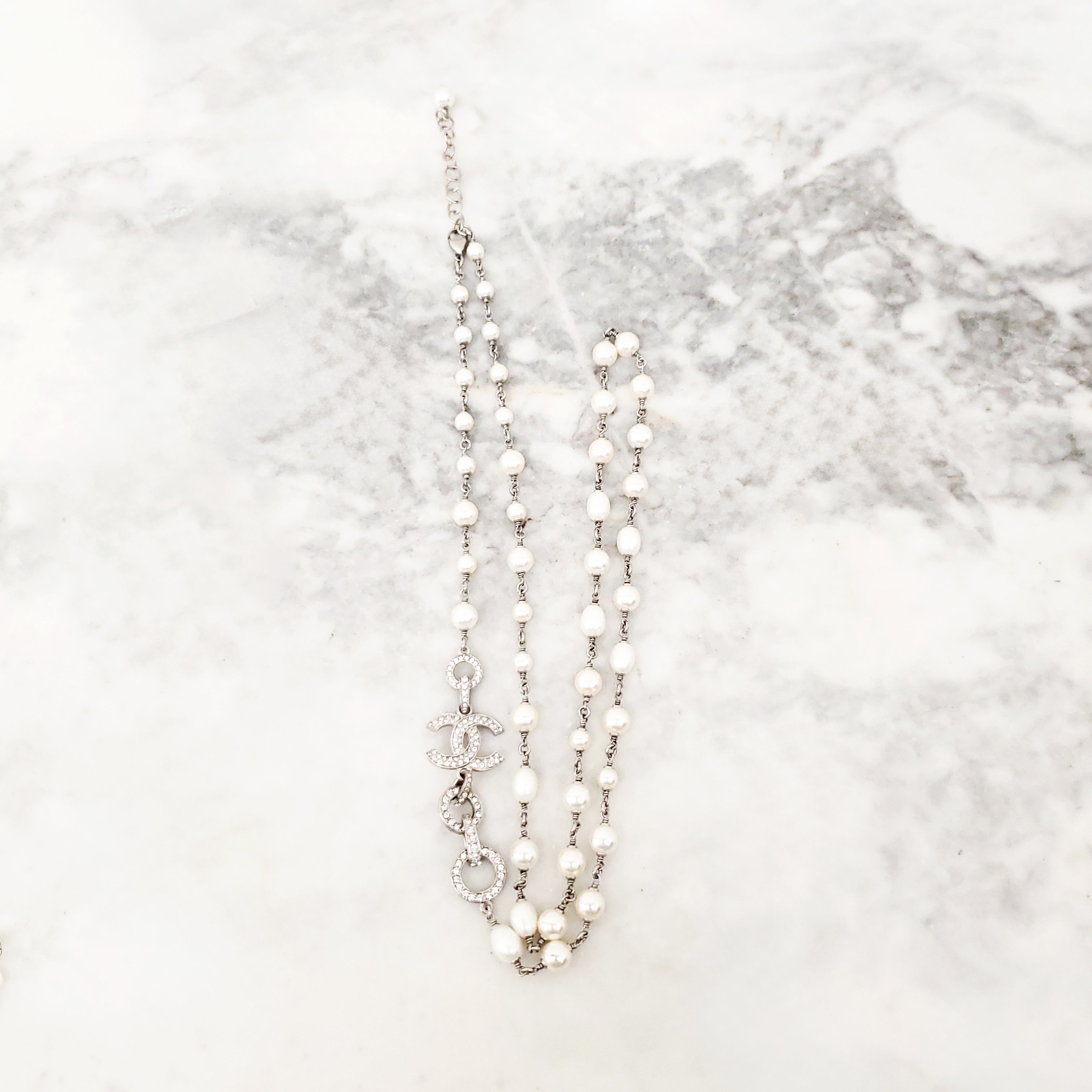 CHANEL PEARL AND SILVER CRYSTAL CHAIN LOGO NECKLACE