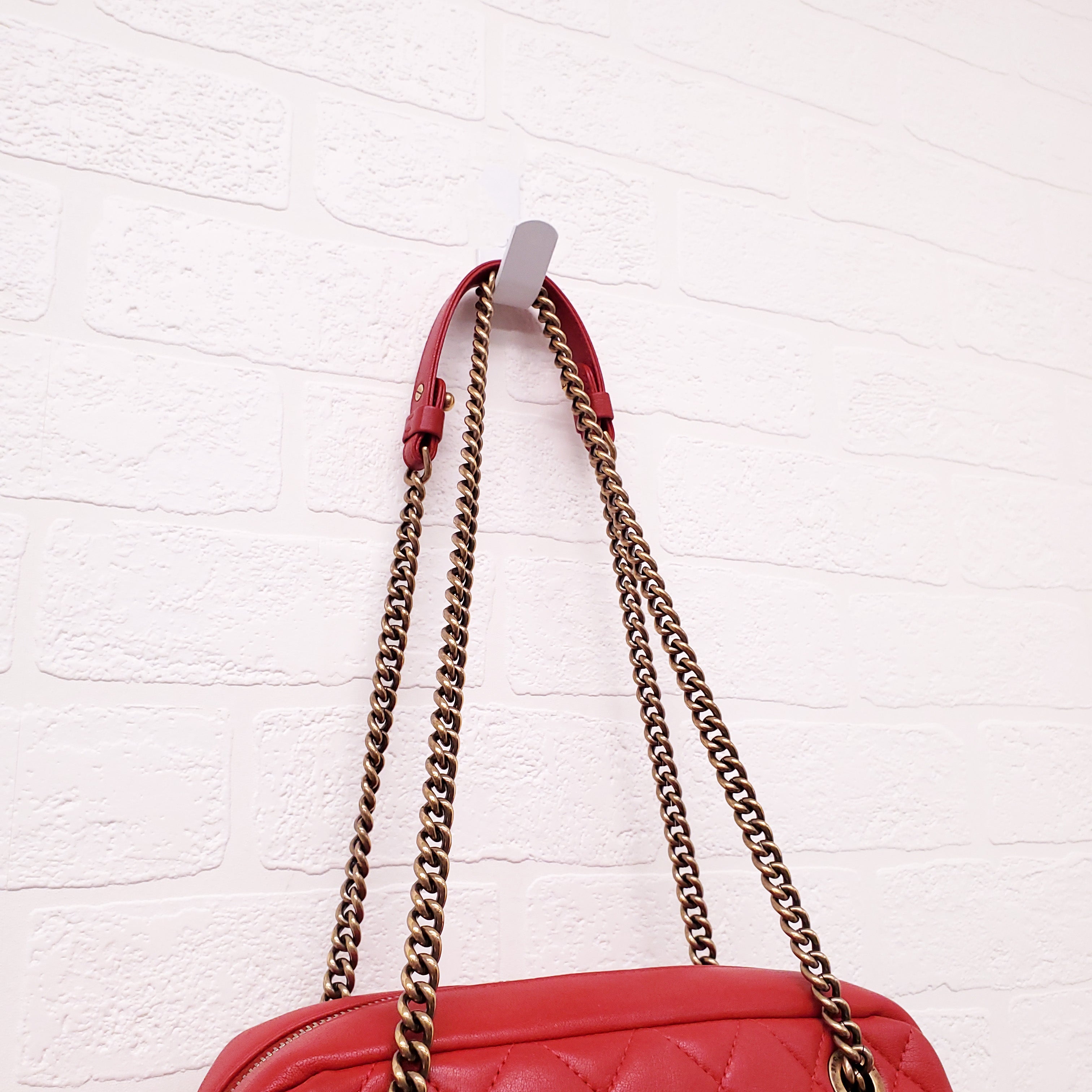 CHANEL RED QUILTED FRONT POCKET CAMERA BAG