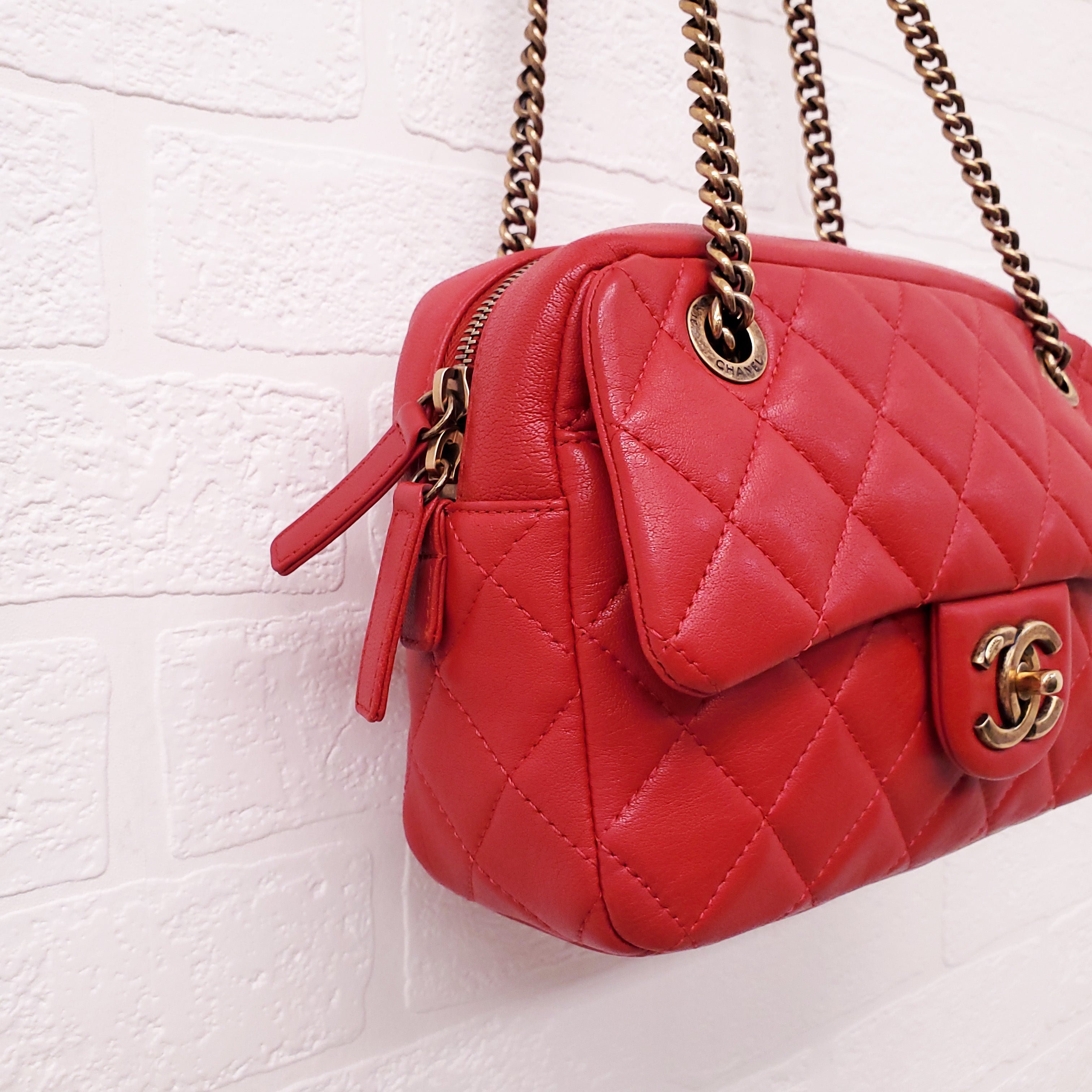 CHANEL RED QUILTED FRONT POCKET CAMERA BAG