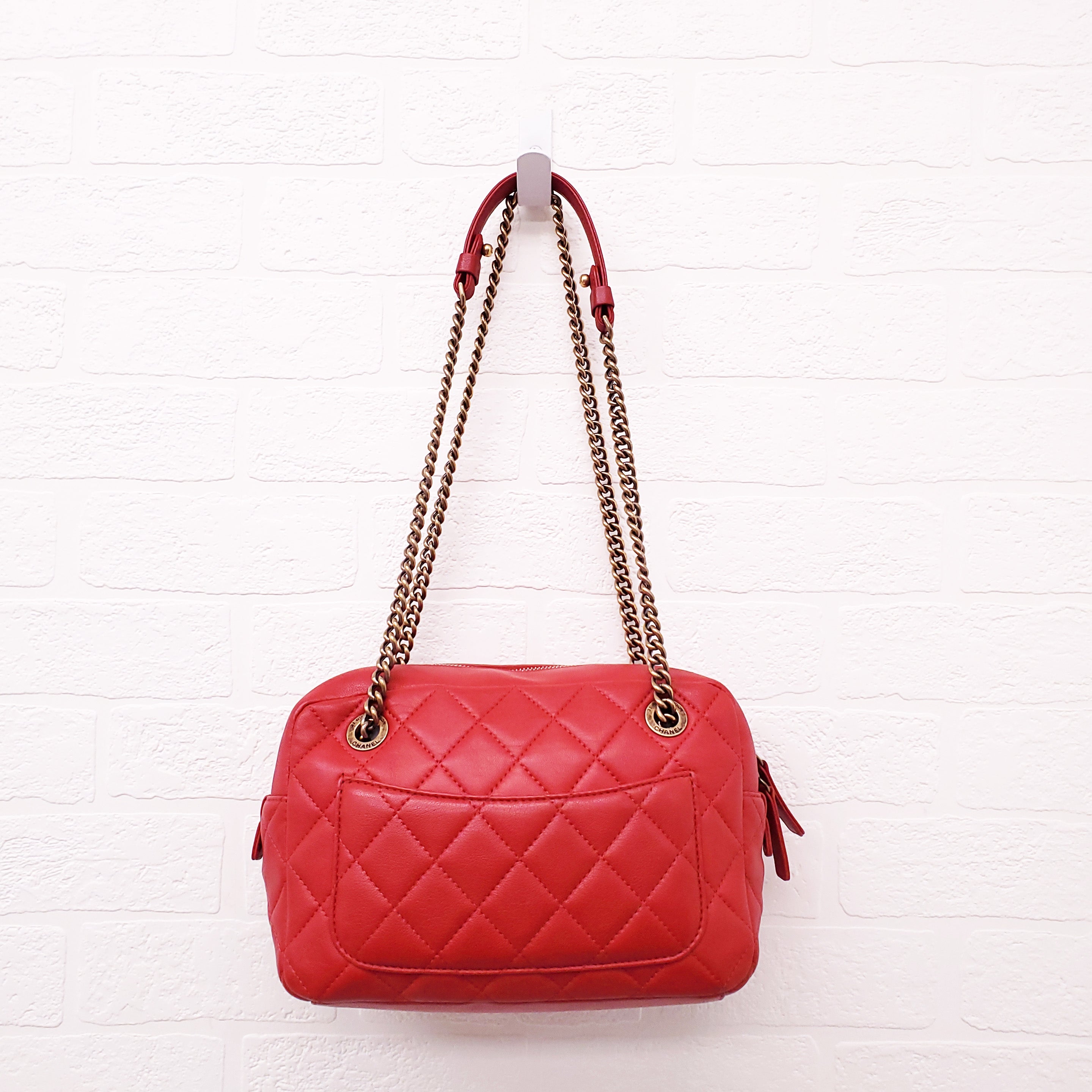 CHANEL RED QUILTED FRONT POCKET CAMERA BAG