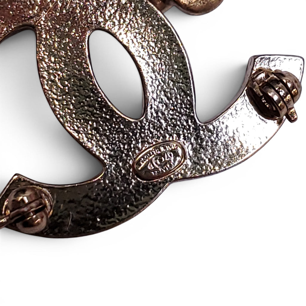 CHANEL SMALL LOGO BROOCH WITH CAMÉLIA FLOWER