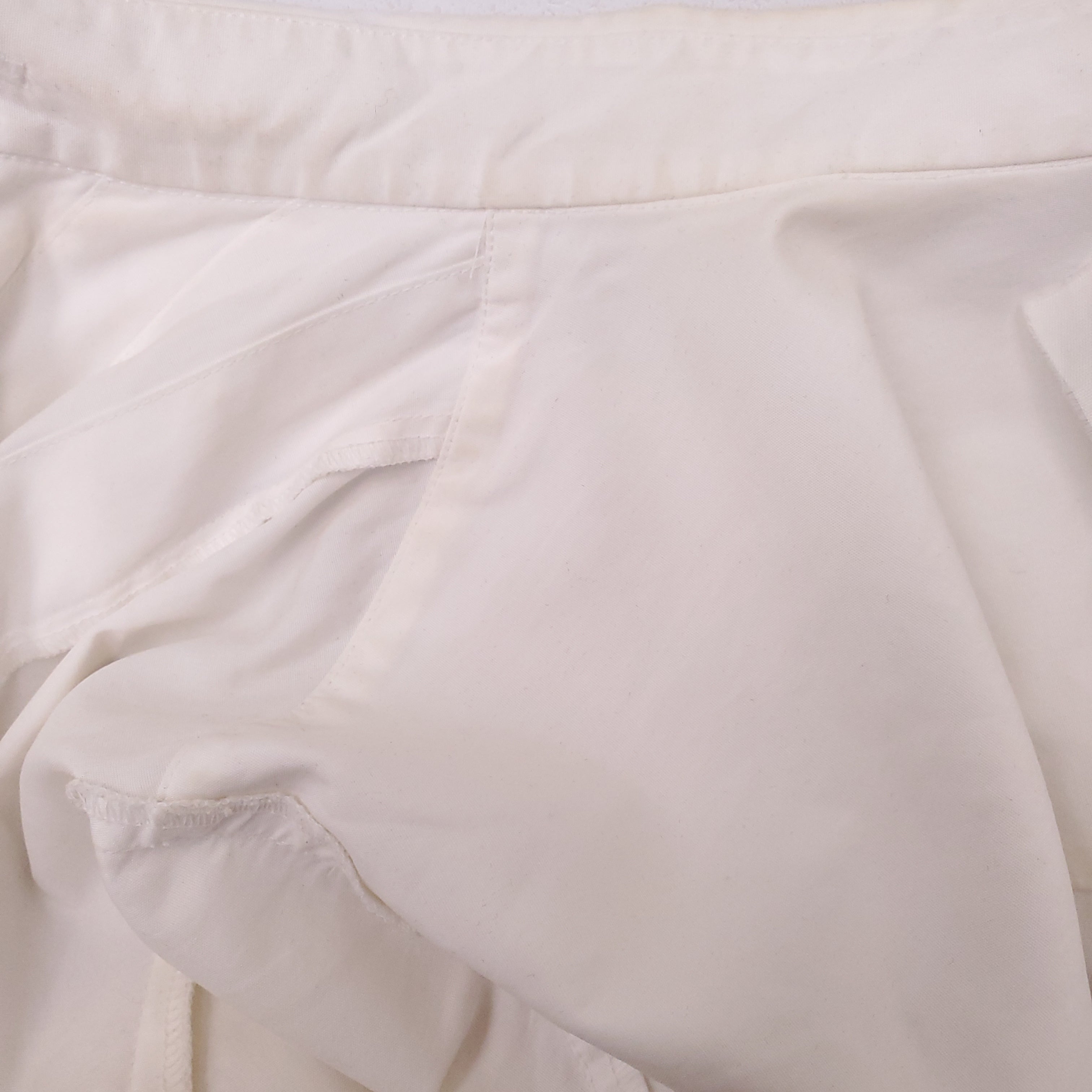 CHANEL WHITE TUXEDO BLOUSE WITH CC PEARL BUTTONS - SIZE 38