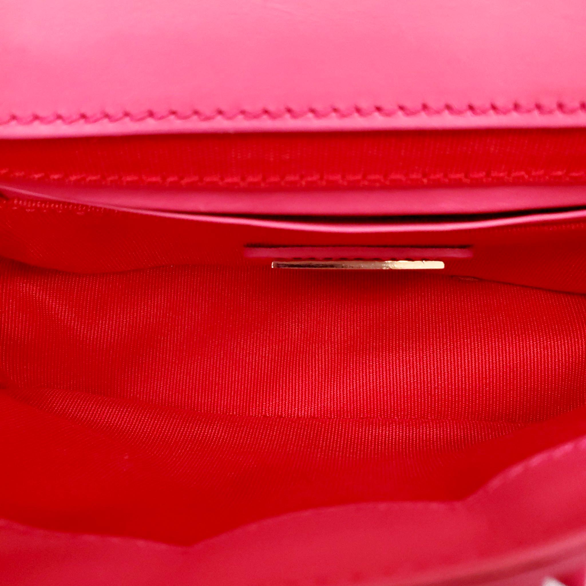 CHRISTIAN LOUBOUTIN HOT PINK STUDDED MINI CROSSBODY BAG