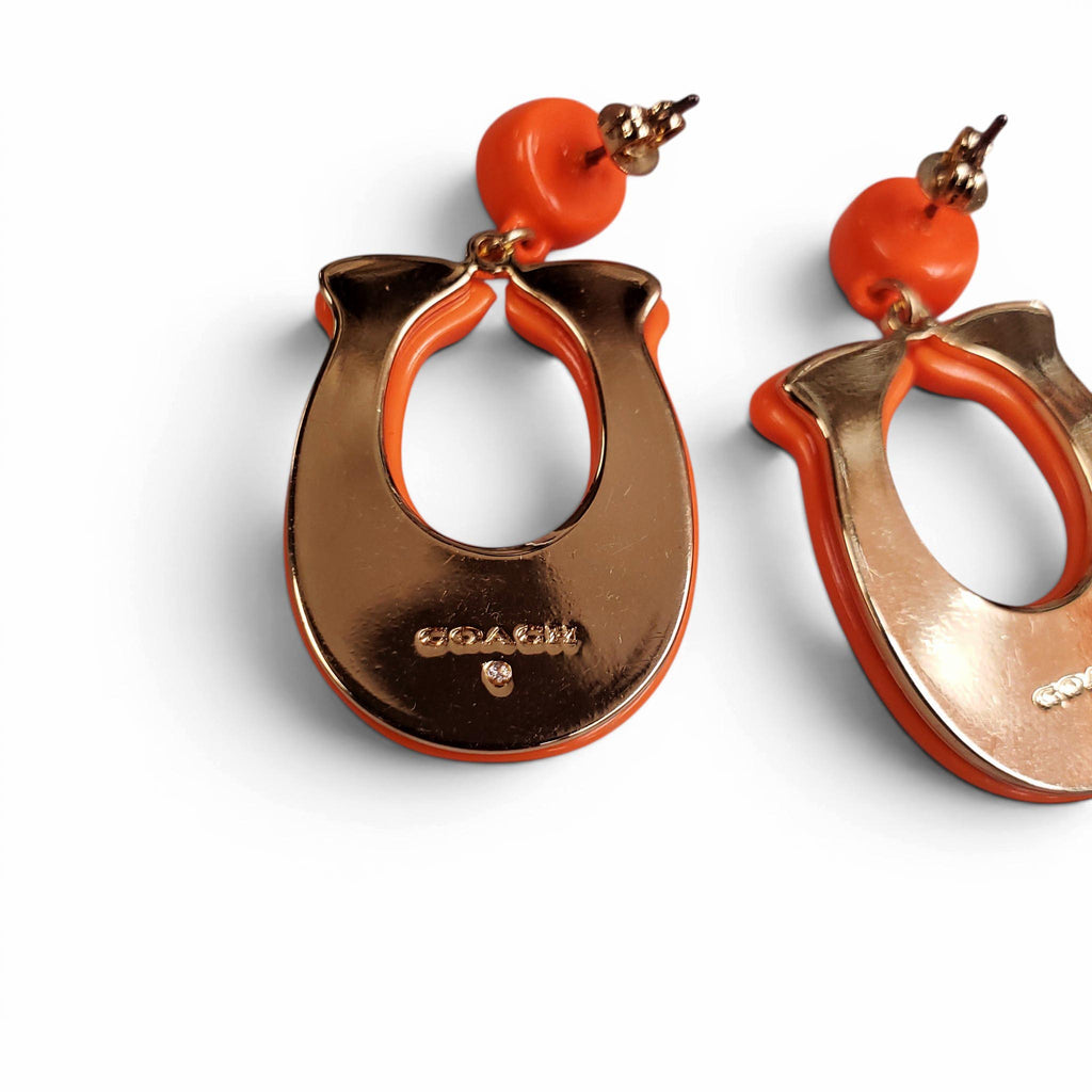 COACH ORANGE CRYSTAL LOGO EARRINGS