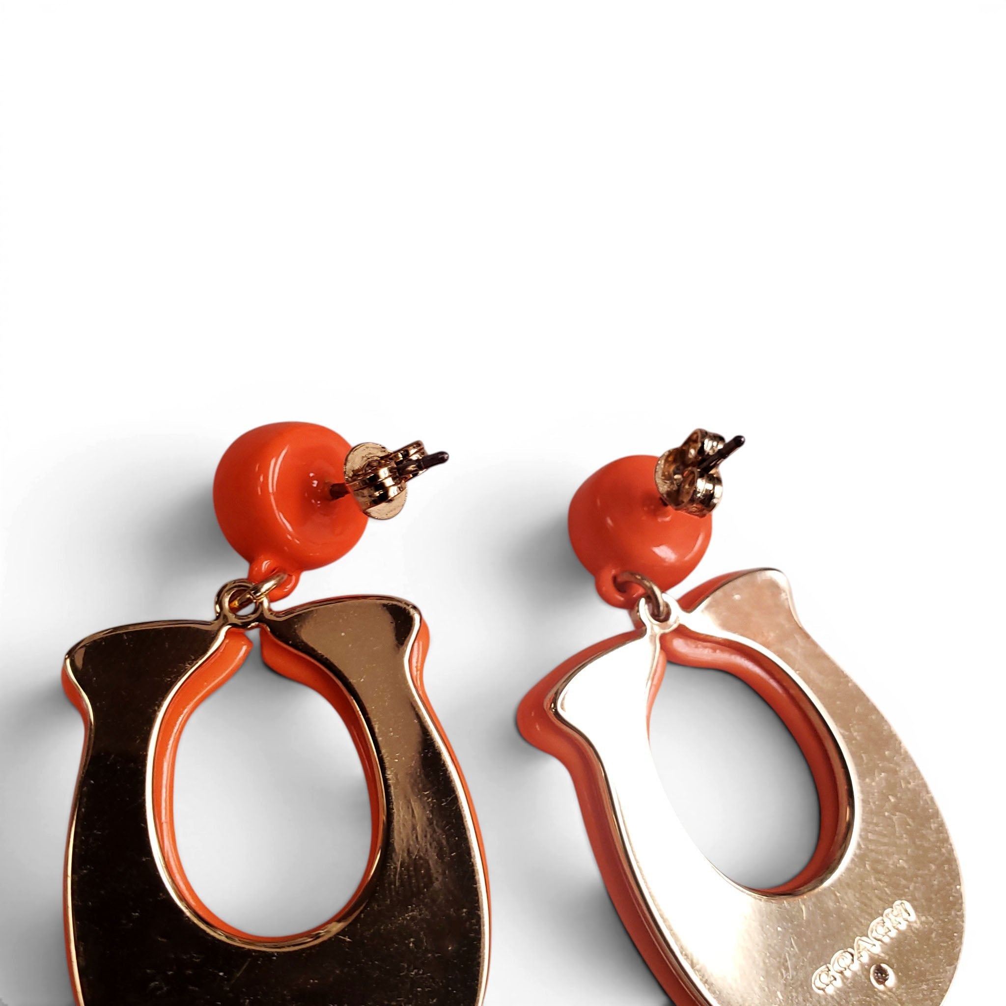 COACH ORANGE CRYSTAL LOGO EARRINGS