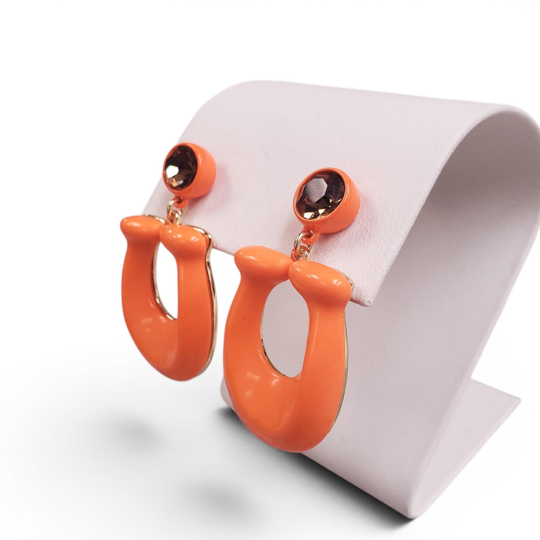 COACH ORANGE CRYSTAL LOGO EARRINGS