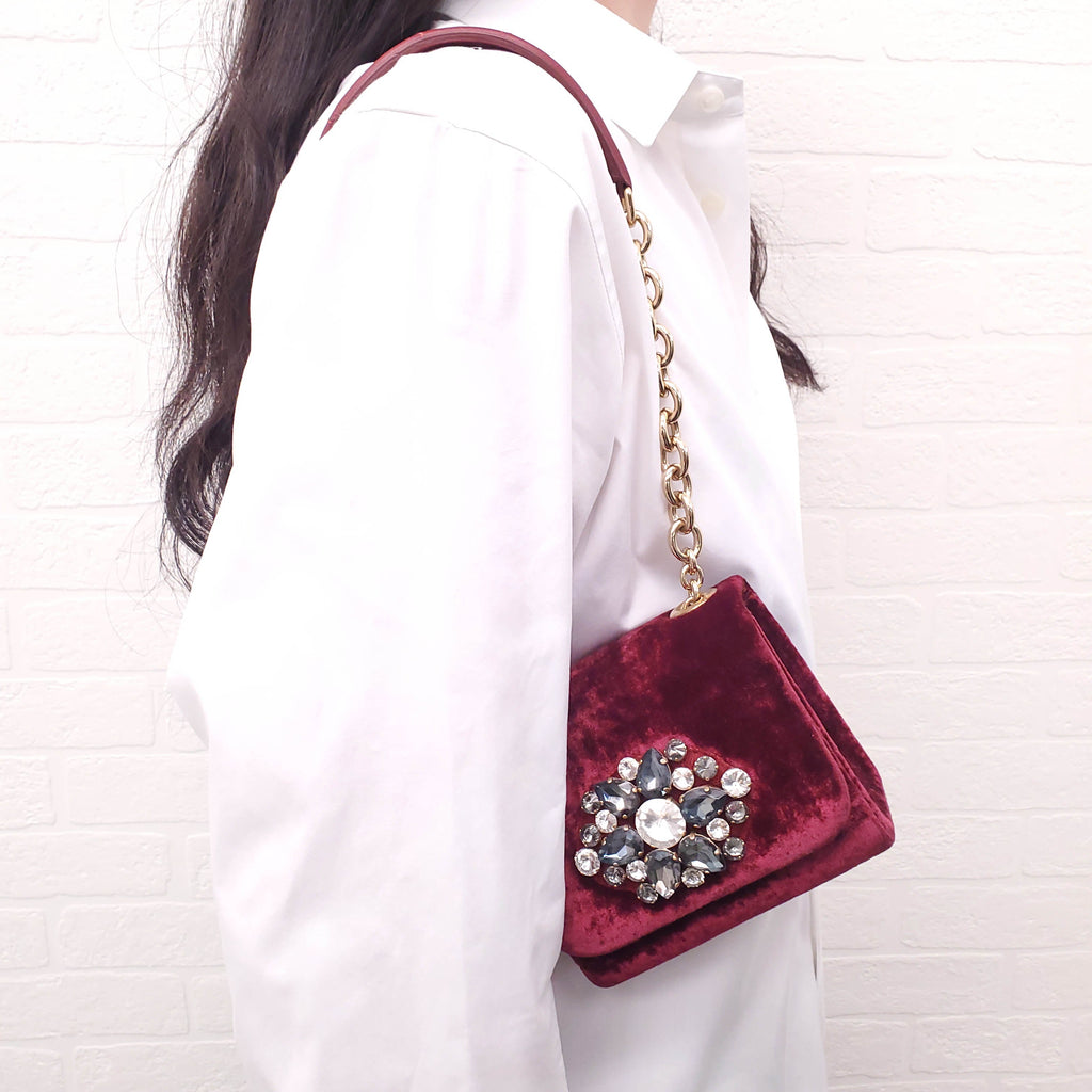 DOLCE & GABBANA BURGUNDY VELVET SHOULDER BAG WITH CRYSTAL EMBLEM
