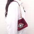 DOLCE & GABBANA BURGUNDY VELVET SHOULDER BAG WITH CRYSTAL EMBLEM