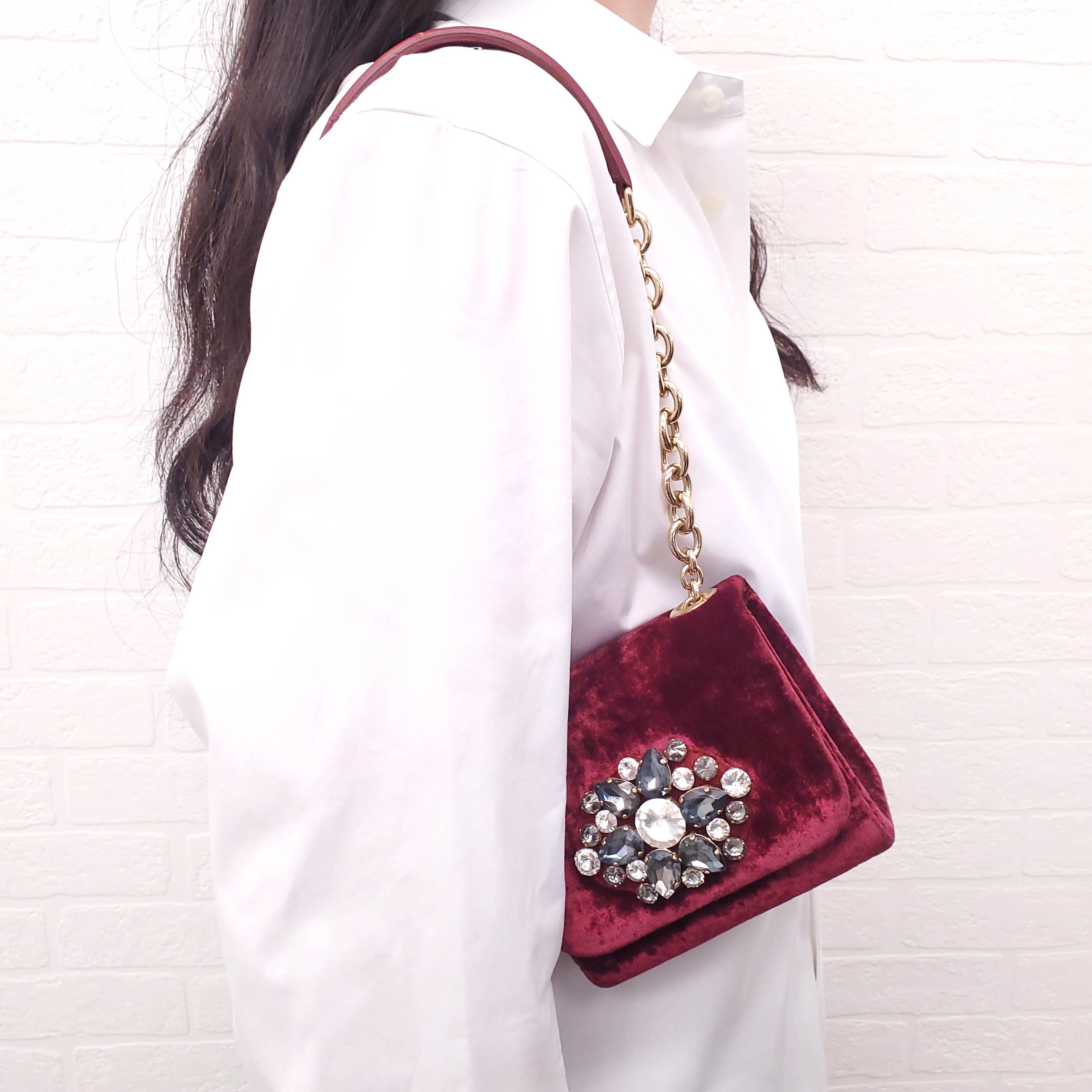DOLCE & GABBANA BURGUNDY VELVET SHOULDER BAG WITH CRYSTAL EMBLEM