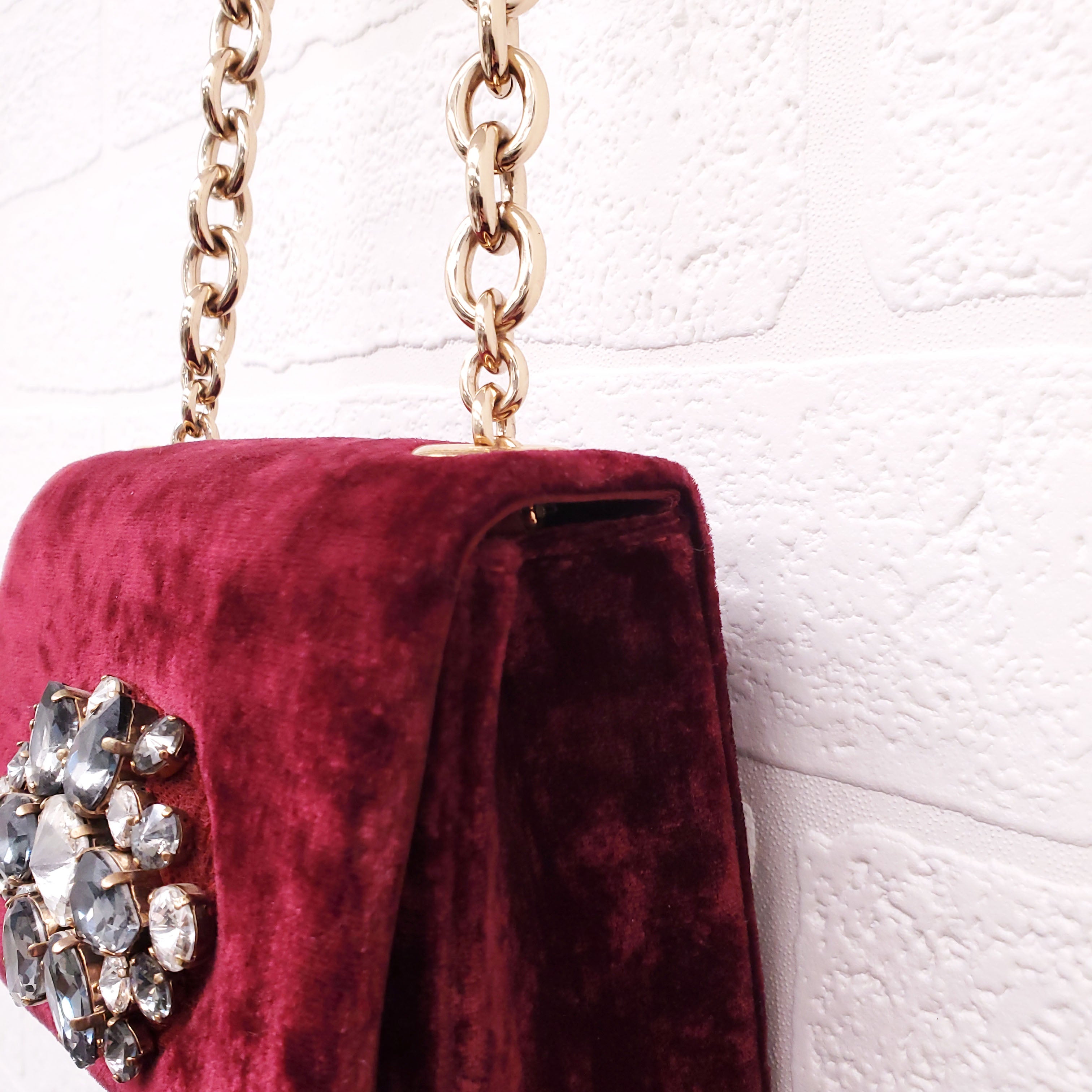 DOLCE & GABBANA BURGUNDY VELVET SHOULDER BAG WITH CRYSTAL EMBLEM
