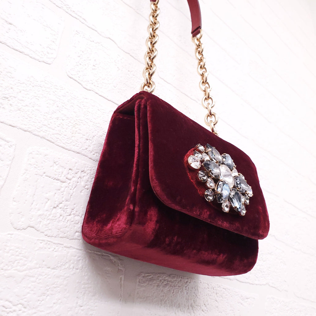 DOLCE & GABBANA BURGUNDY VELVET SHOULDER BAG WITH CRYSTAL EMBLEM