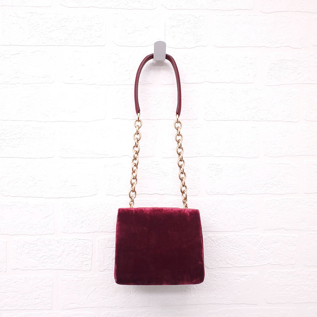 DOLCE & GABBANA BURGUNDY VELVET SHOULDER BAG WITH CRYSTAL EMBLEM