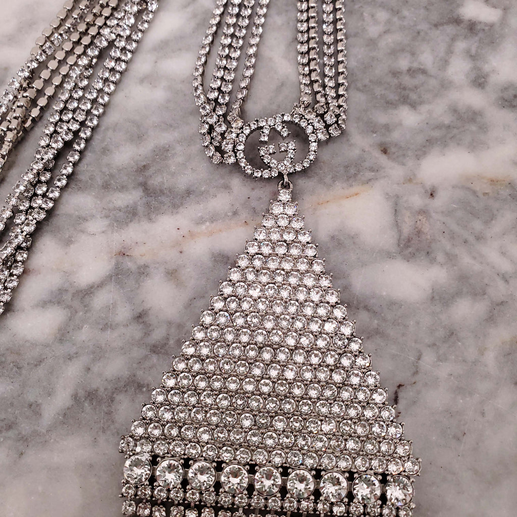 GUCCI CRYSTAL LOGO TRIANGLE FRINGE NECKLACE