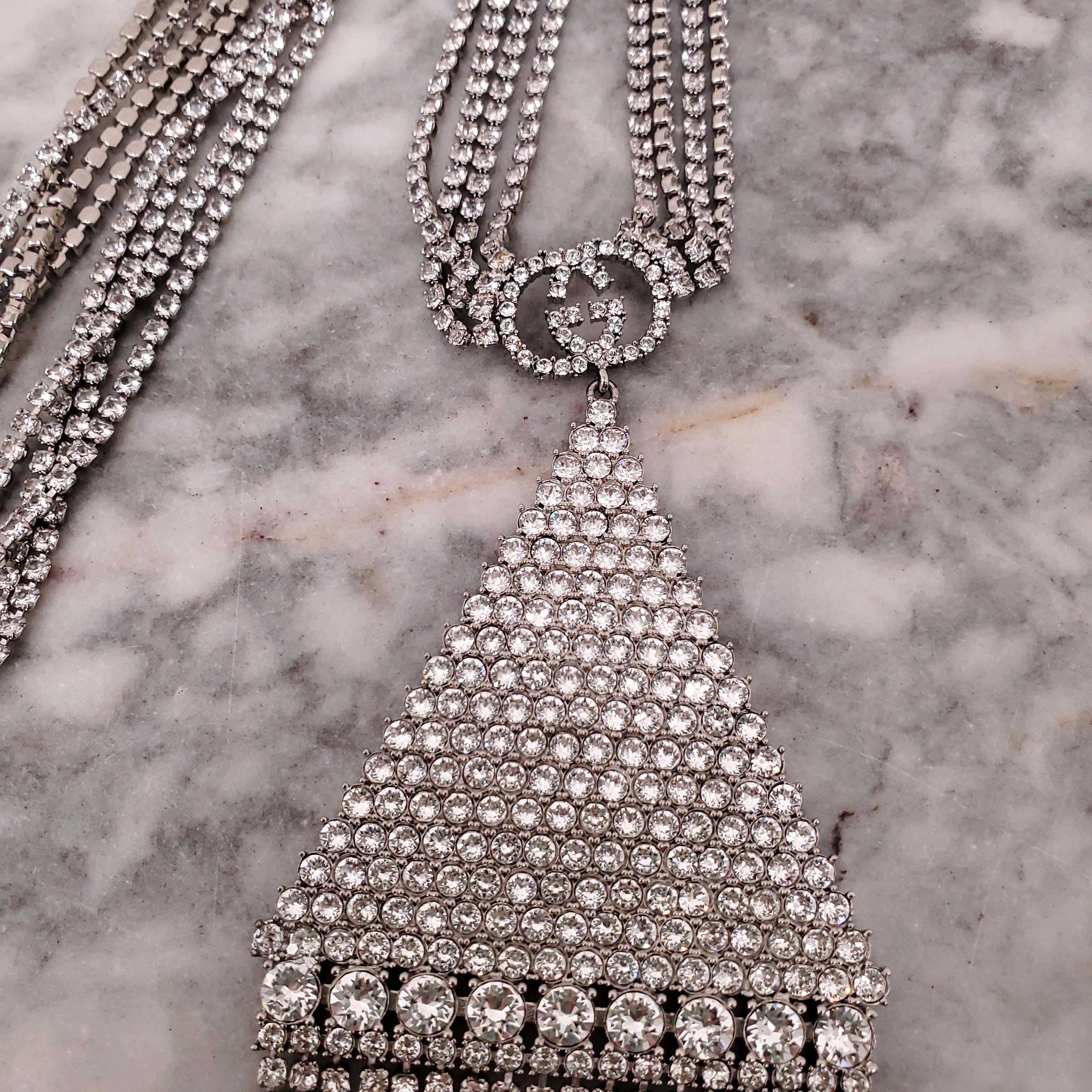 GUCCI CRYSTAL LOGO TRIANGLE FRINGE NECKLACE