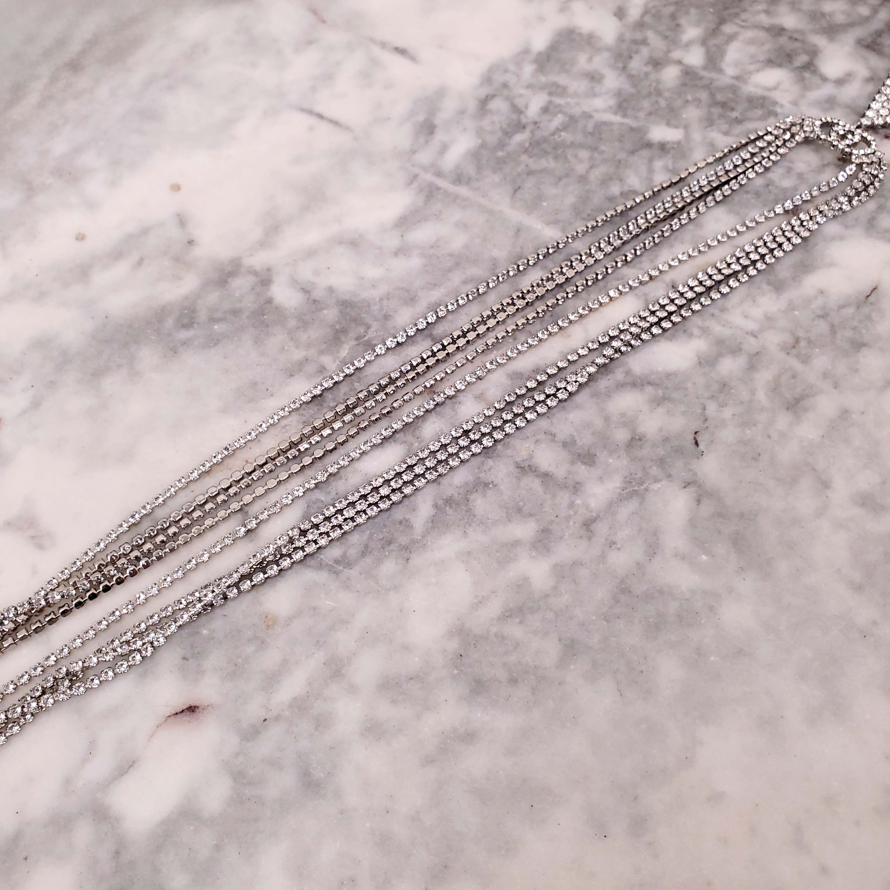 GUCCI CRYSTAL LOGO TRIANGLE FRINGE NECKLACE