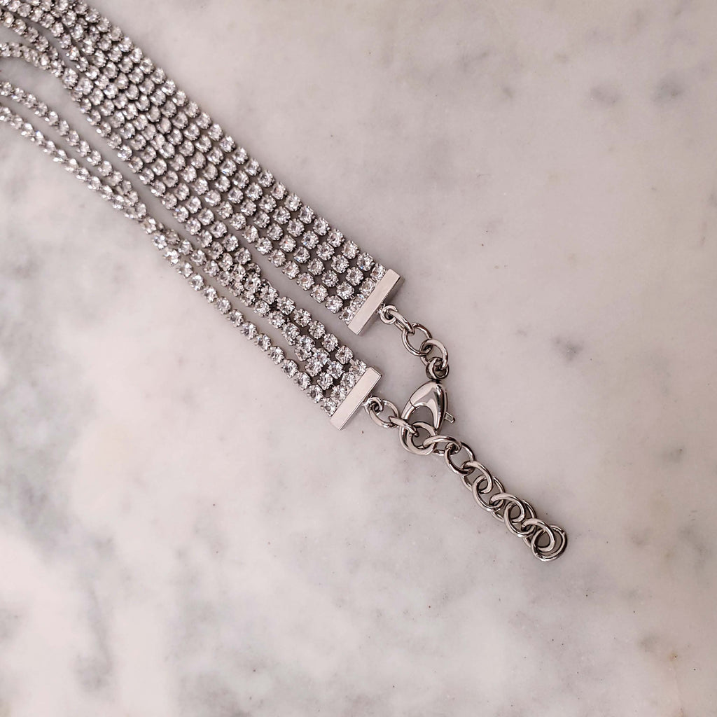 GUCCI CRYSTAL LOGO TRIANGLE FRINGE NECKLACE