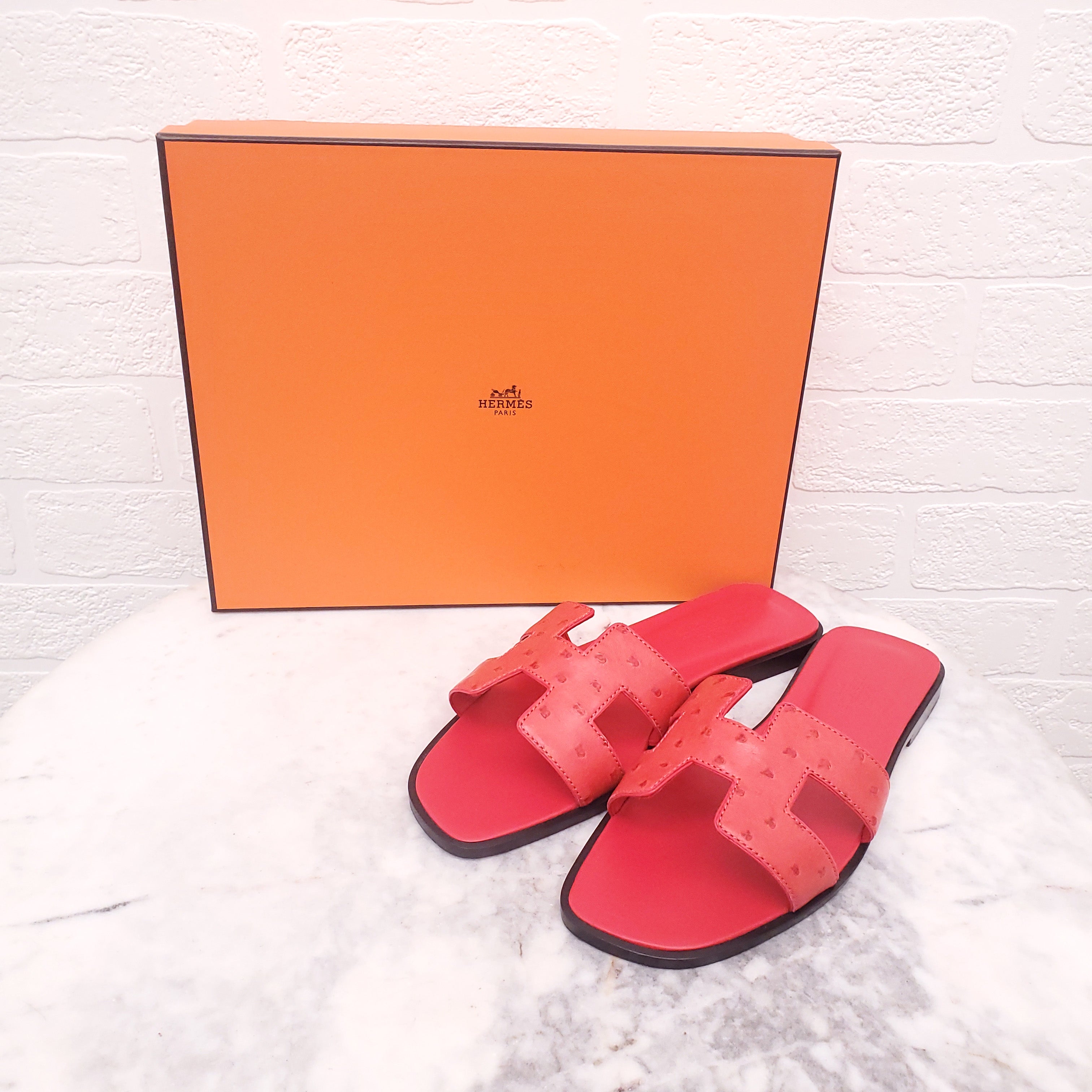 HERMÈS RED OSTRICH ORAN SANDALS - SIZE 36.5
