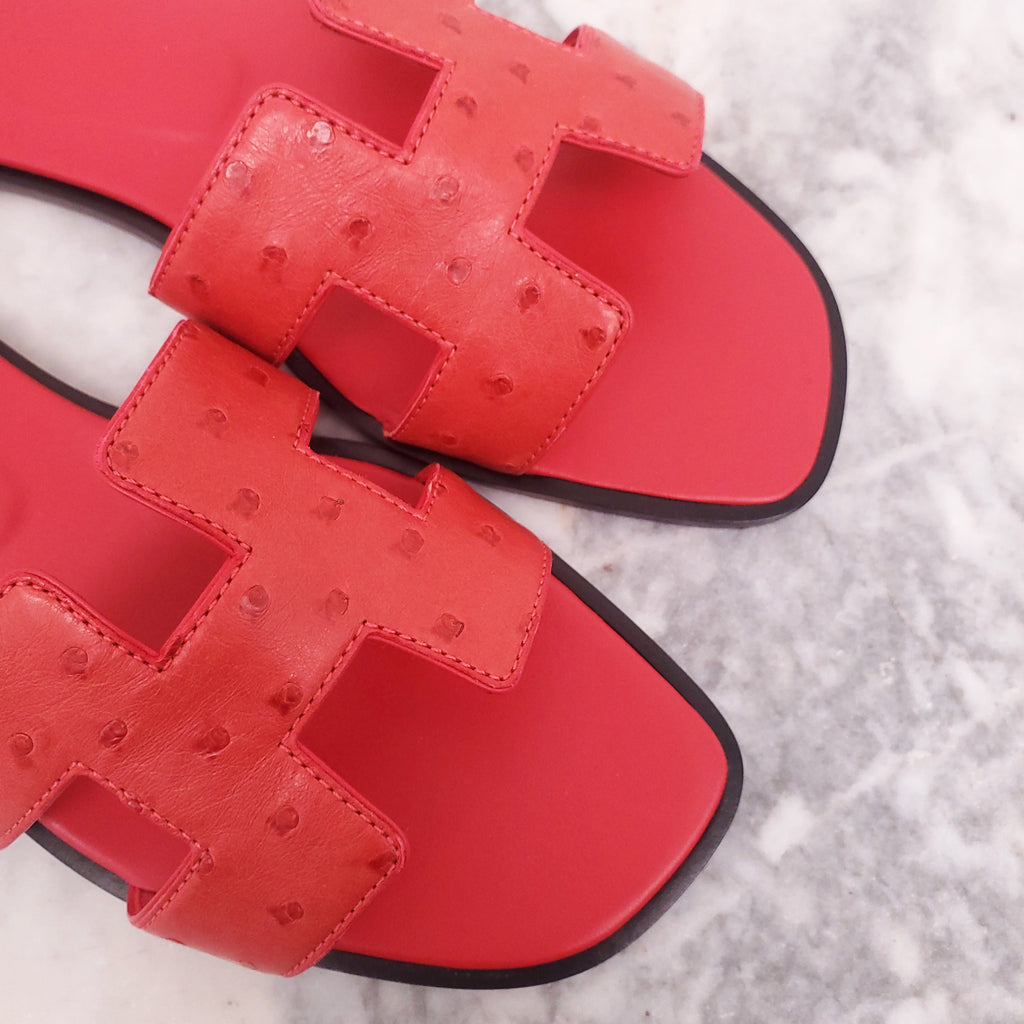 HERMÈS RED OSTRICH ORAN SANDALS - SIZE 36.5