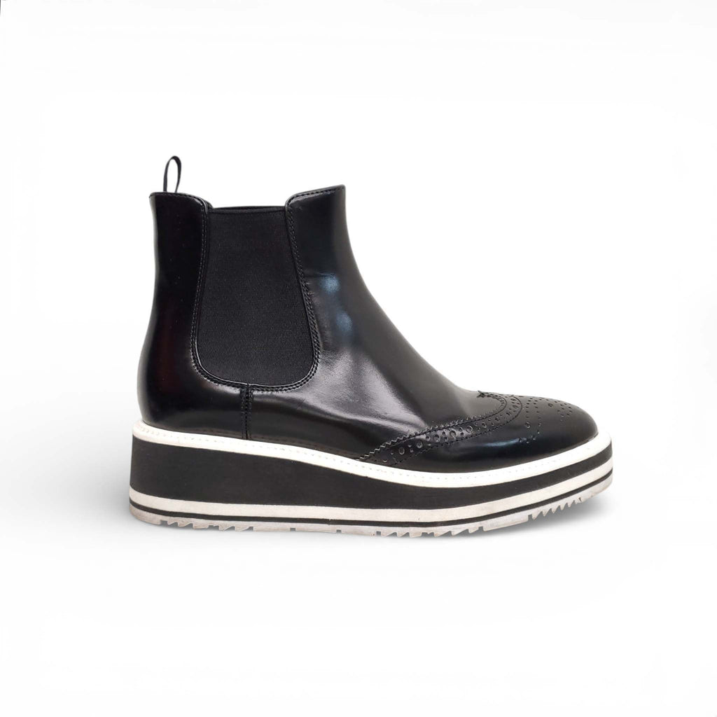 PRADA BLACK AND WHITE SPECTATOR CHELSEA BOOTS - SIZE 35.5